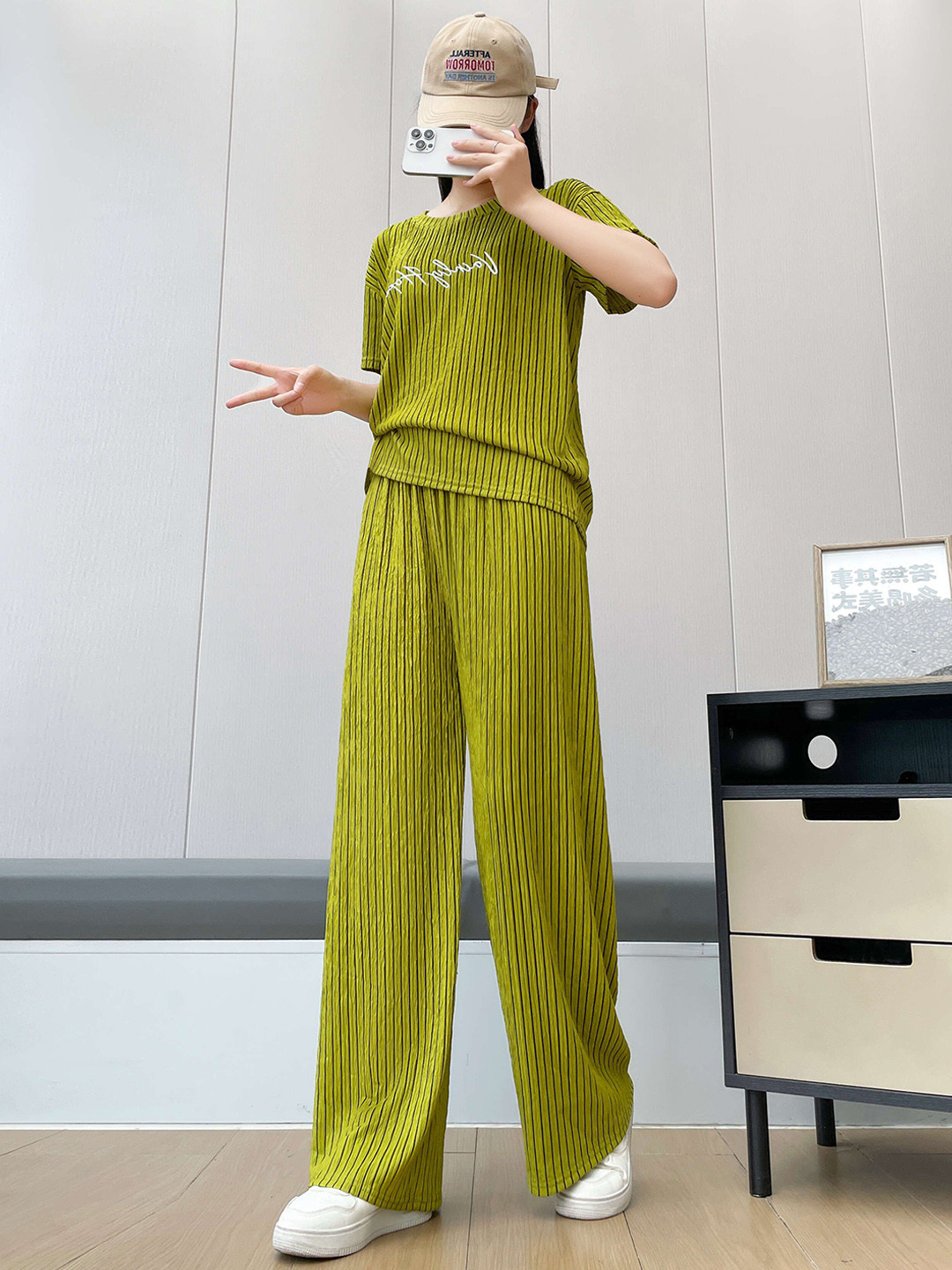 Lugo Striped Self Design Round Neck T-Shirt With Palazzo, Green
Lugo Striped Self Design Round Neck T-Shirt With Palazzo, Green