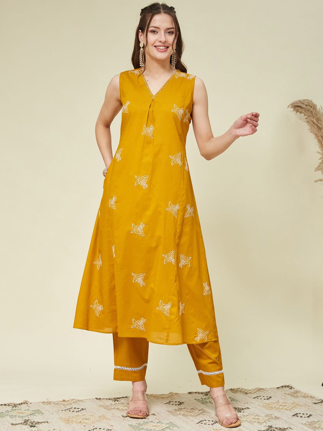 MOKOSH Floral Embroidered V-Neck Pleated Thread Work A-Line Kurta With Trouser, Mustard
MOKOSH Floral Embroidered V-Neck Pleated Thread Work A-Line Kurta With Trouser, Mustard