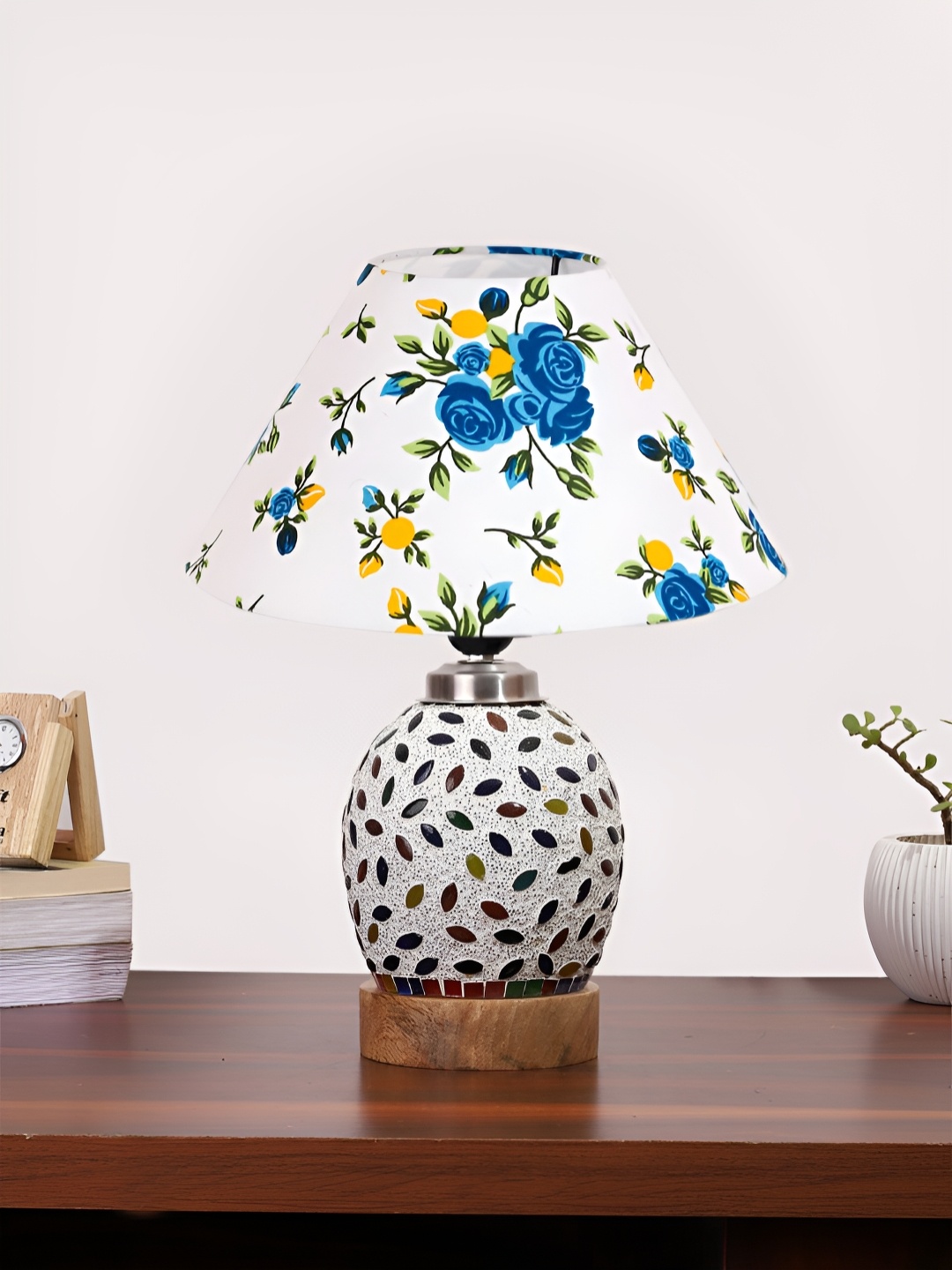 Devansh White Floral Printed Wooden Frustum Shaped Table Lamp With Mosaic Glass Base
Devansh White Floral Printed Wooden Frustum Shaped Table Lamp With Mosaic Glass Base