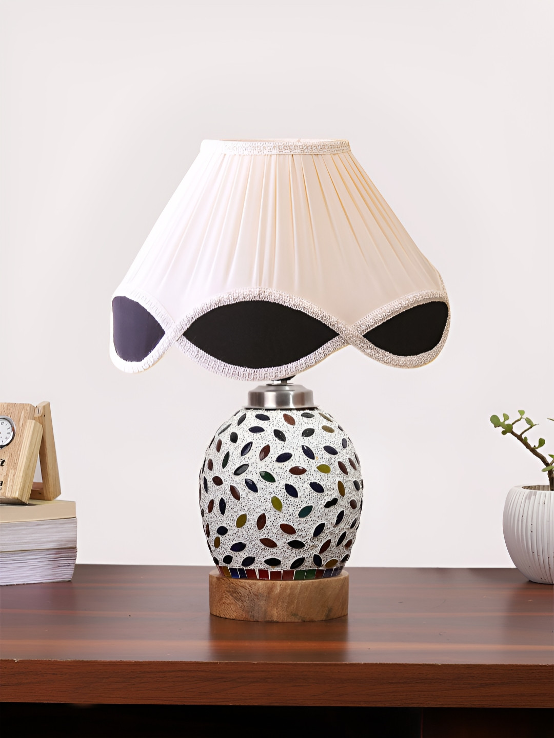 Devansh Off White Printed Wooden Frustum Shaped Table Lamp With Mosaic Glass Base
Devansh Off White Printed Wooden Frustum Shaped Table Lamp With Mosaic Glass Base