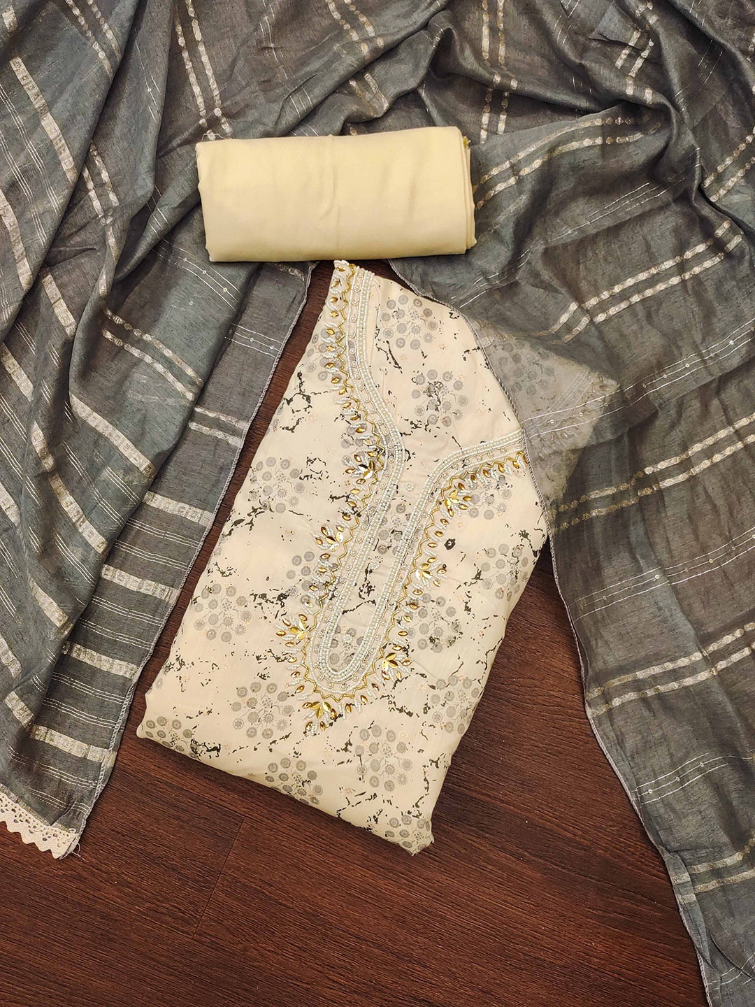 SHADOW & SAINING Ethnic Motifs Embellished Beads And Stones Semi-Stitched Dress Material, Beige
SHADOW & SAINING Ethnic Motifs Embellished Beads And Stones Semi-Stitched Dress Material, Beige