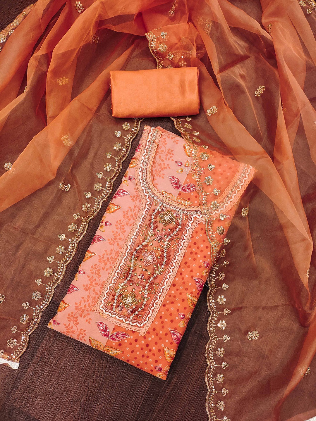 SHADOW & SAINING Floral Embroidered Beads And Stones Organza Semi-Stitched Dress Material, Orange
SHADOW & SAINING Floral Embroidered Beads And Stones Organza Semi-Stitched Dress Material, Orange