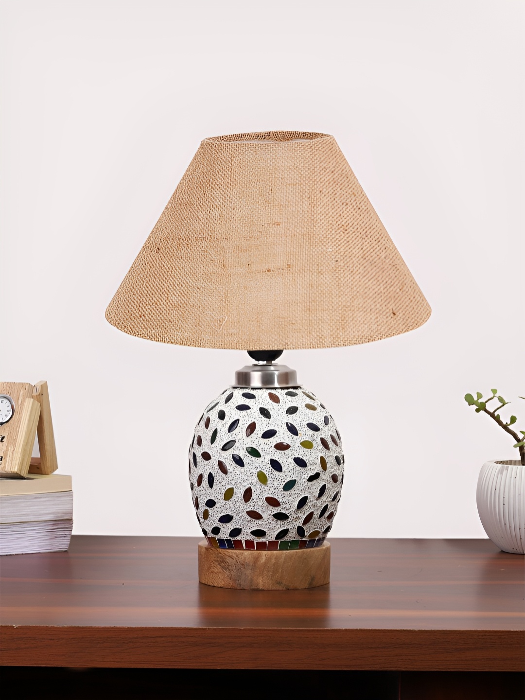 Devansh Beige & White Printed Wooden Frustum Shaped Table Lamp With Mosaic Glass Base
Devansh Beige & White Printed Wooden Frustum Shaped Table Lamp With Mosaic Glass Base
