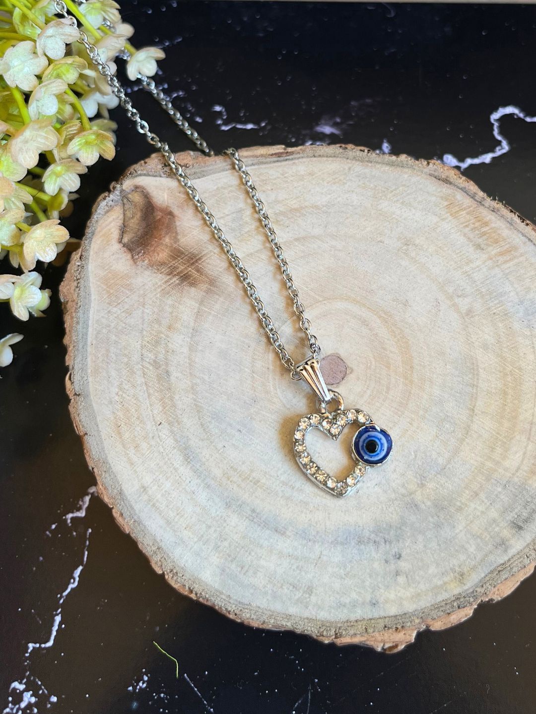 DressBerry Silver-Plated Cubic Zirconia Studded Evil Eye Heart Shaped Pendant With Chain
DressBerry Silver-Plated Cubic Zirconia Studded Evil Eye Heart Shaped Pendant With Chain