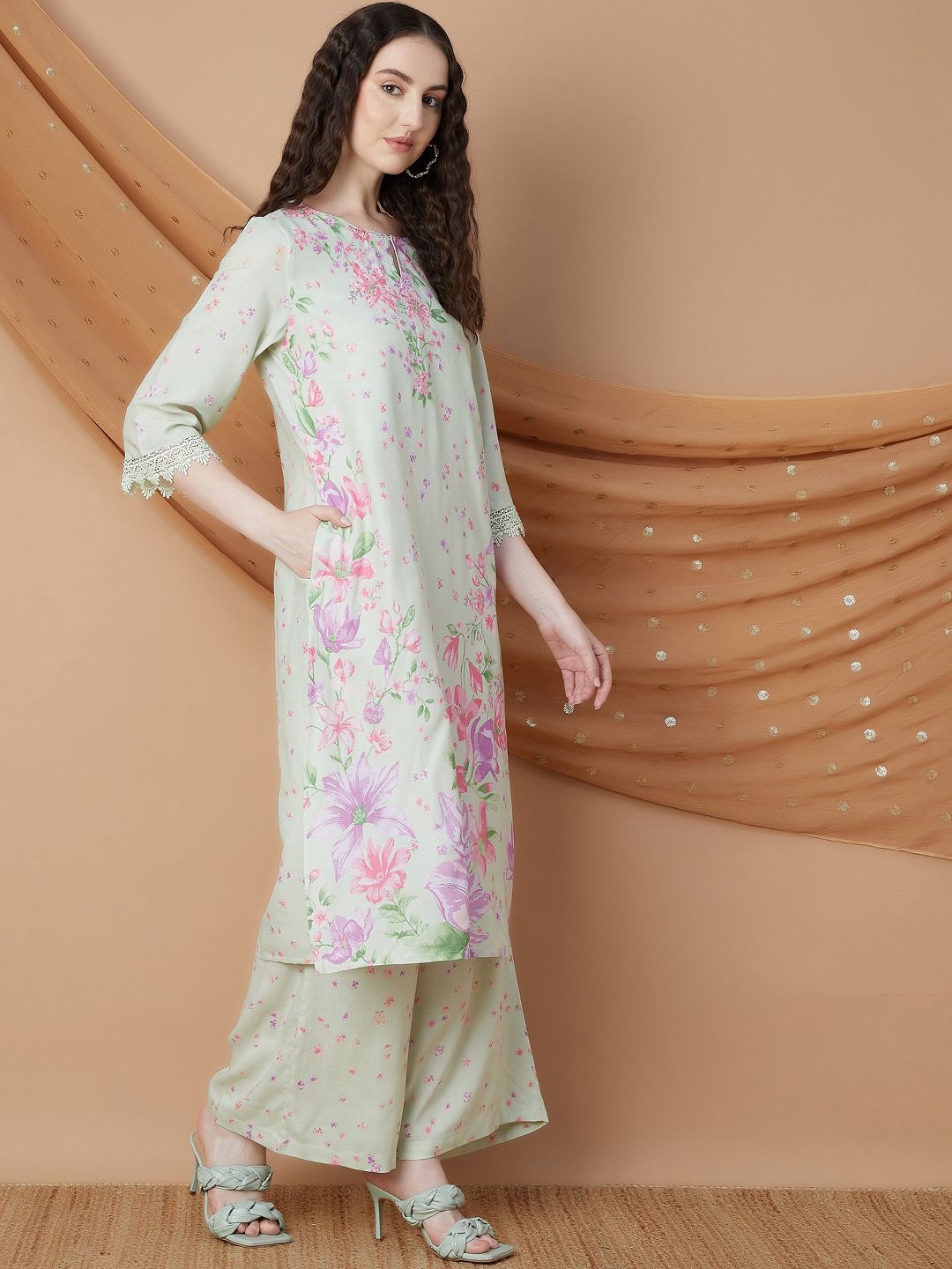 Melange by Lifestyle Floral Printed Sequinned Keyhole Neck Straight Kurta with Palazzos, Grey
Melange by Lifestyle Floral Printed Sequinned Keyhole Neck Straight Kurta with Palazzos, Grey