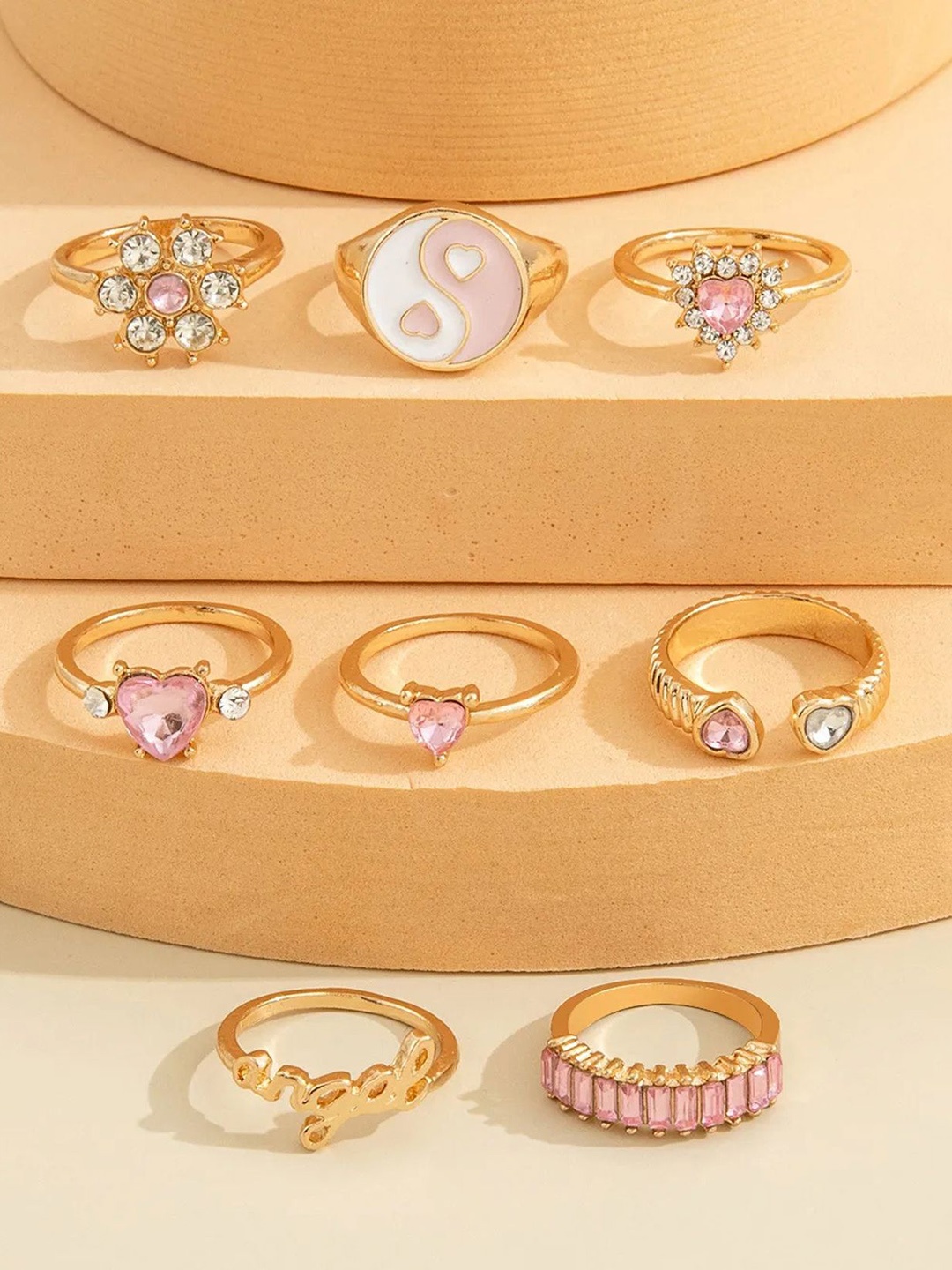 DressBerry Set of 8 Gold Plated Artificial Stone Studded Stainless Steel Finger Rings
DressBerry Set of 8 Gold Plated Artificial Stone Studded Stainless Steel Finger Rings