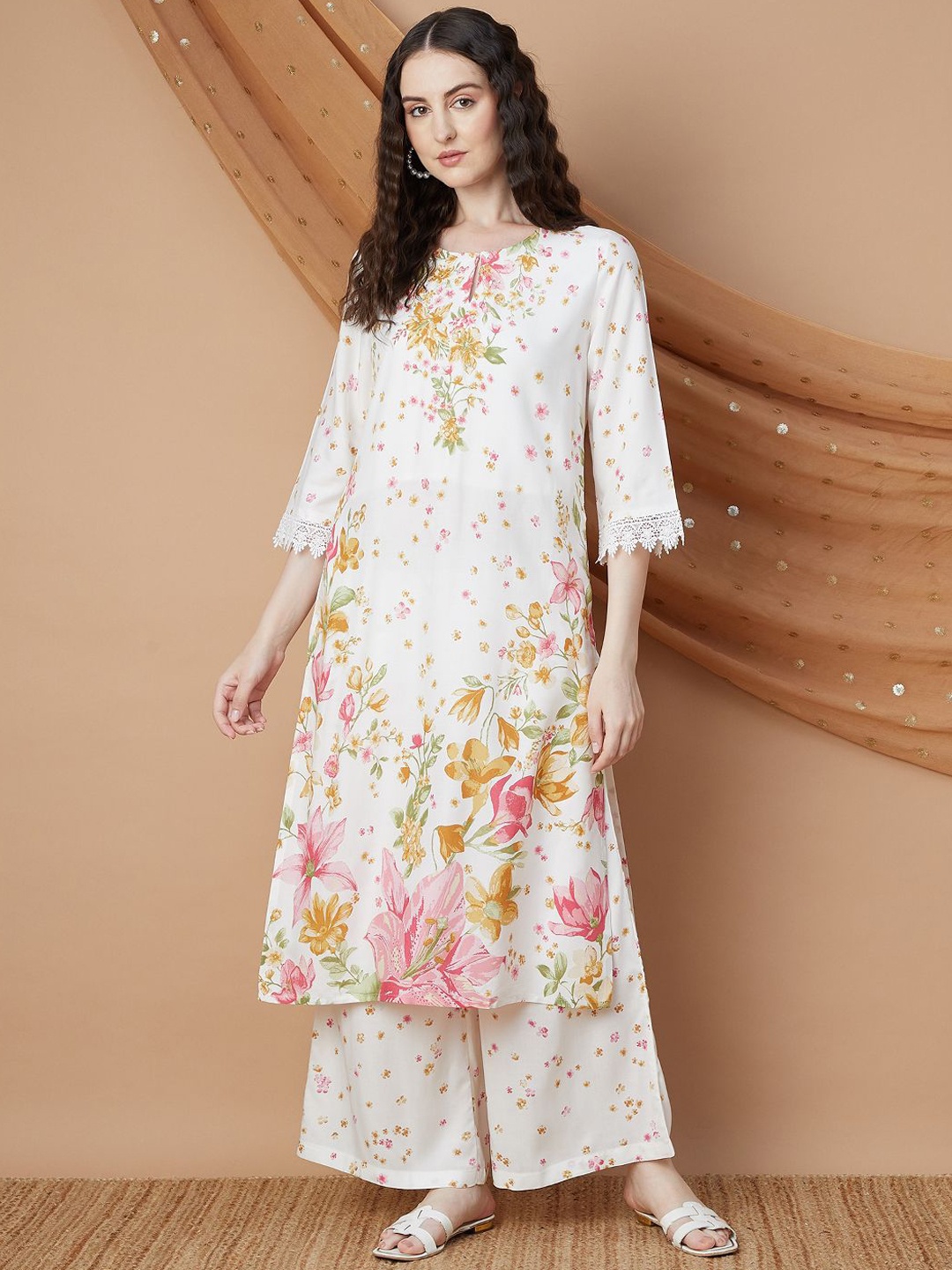 Melange by Lifestyle Floral Printed Sequinned Keyhole Neck Straight Kurta with Palazzos, Off white
Melange by Lifestyle Floral Printed Sequinned Keyhole Neck Straight Kurta with Palazzos, Off white