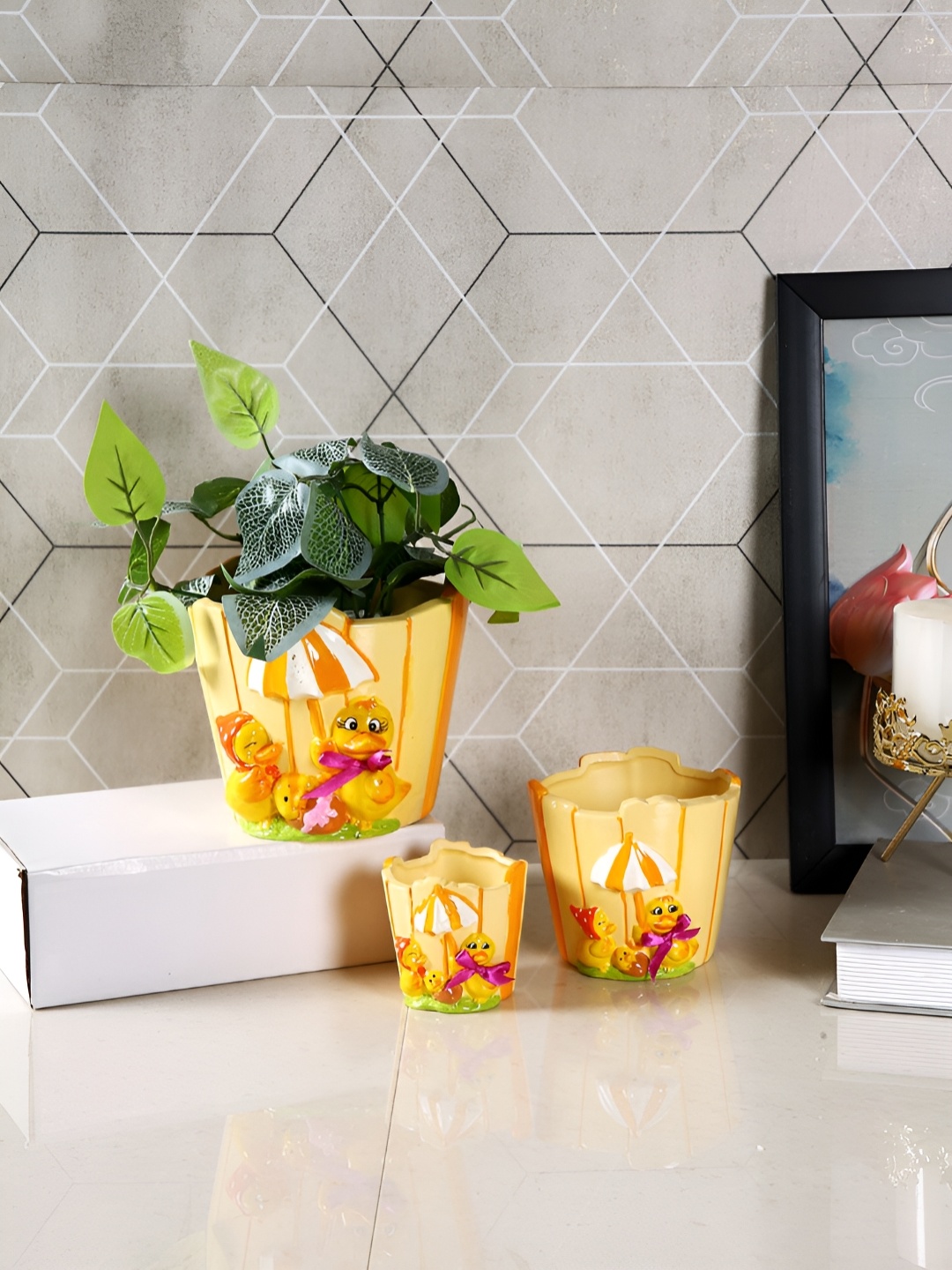 TAYHAA Yellow & White 3 Pieces Sunshine Duckling Printed Ceramic Flower Planters
TAYHAA Yellow & White 3 Pieces Sunshine Duckling Printed Ceramic Flower Planters