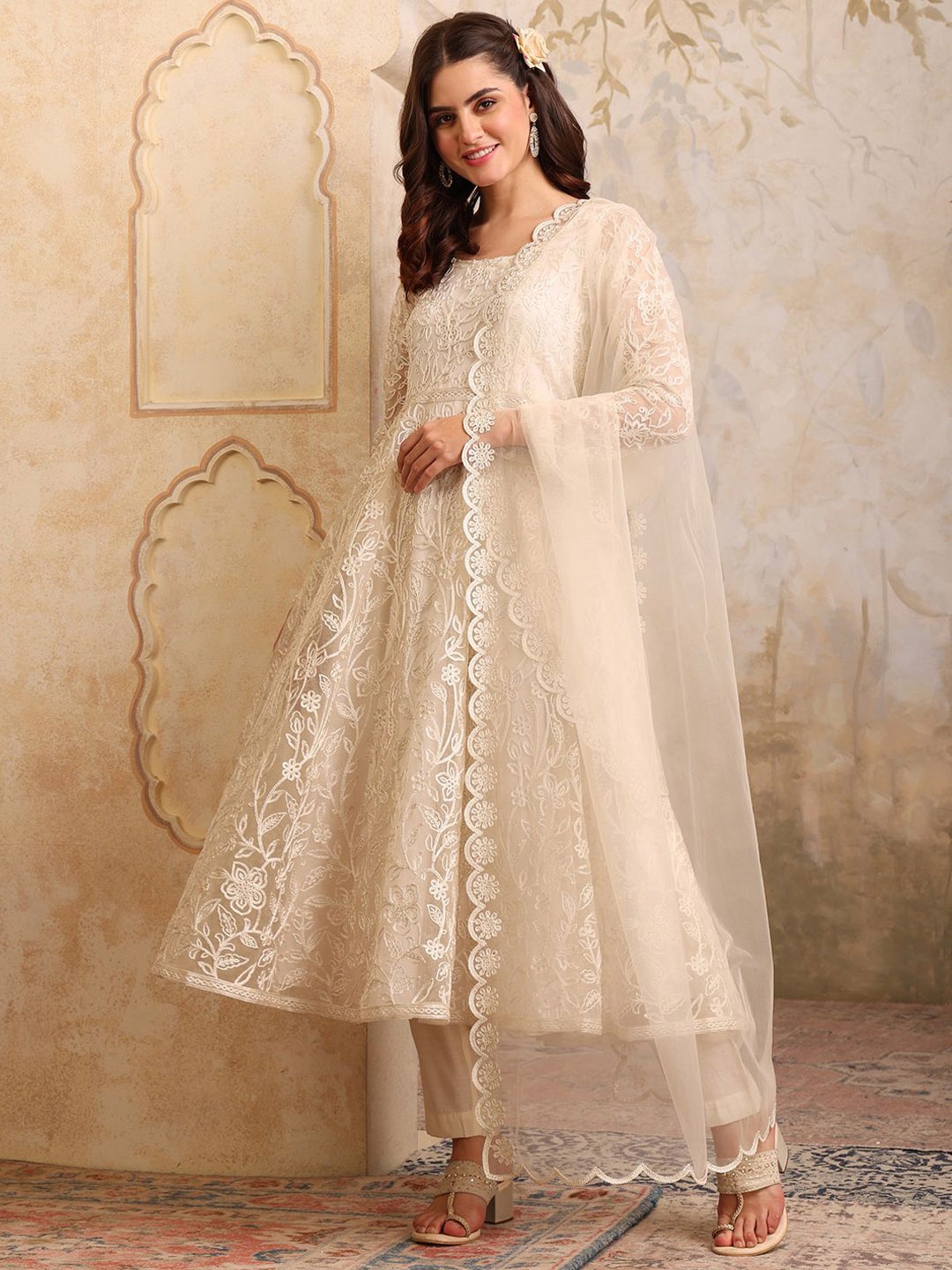 Inddus Women Floral Embroidered Round Neck Anarkali Kurta With Trousers & Dupatta, Off white
Inddus Women Floral Embroidered Round Neck Anarkali Kurta With Trousers & Dupatta, Off white