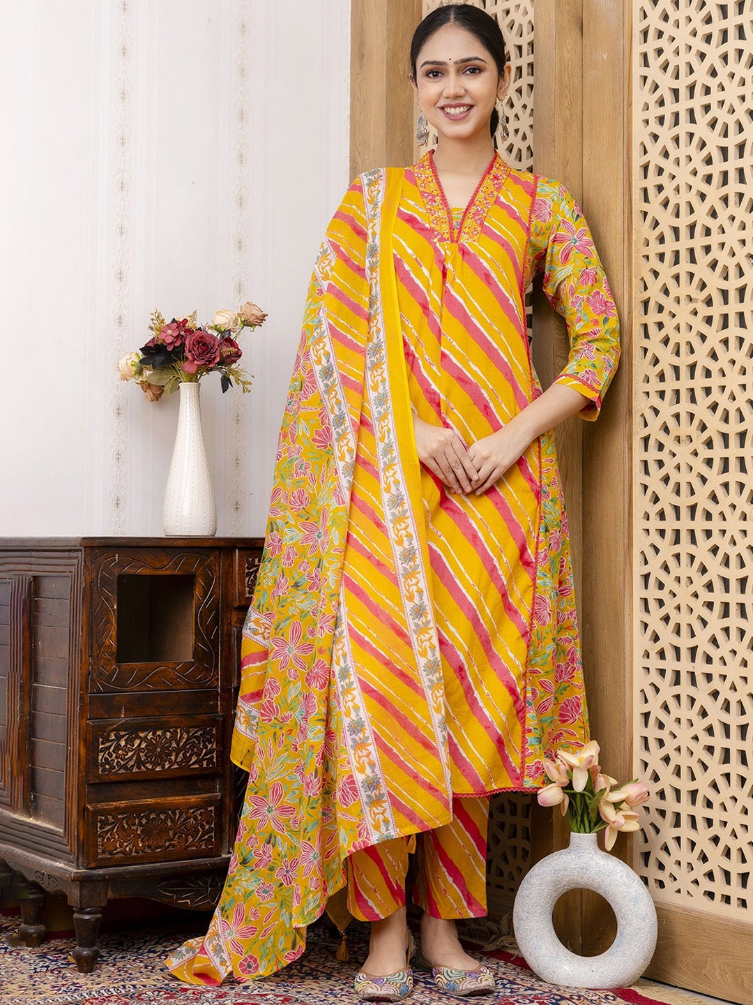 TRIVEDI Leheriya Printed V-Neck Mirror Work Cotton Anarkali Kurta With Trousers & Dupatta, Yellow
TRIVEDI Leheriya Printed V-Neck Mirror Work Cotton Anarkali Kurta With Trousers & Dupatta, Yellow