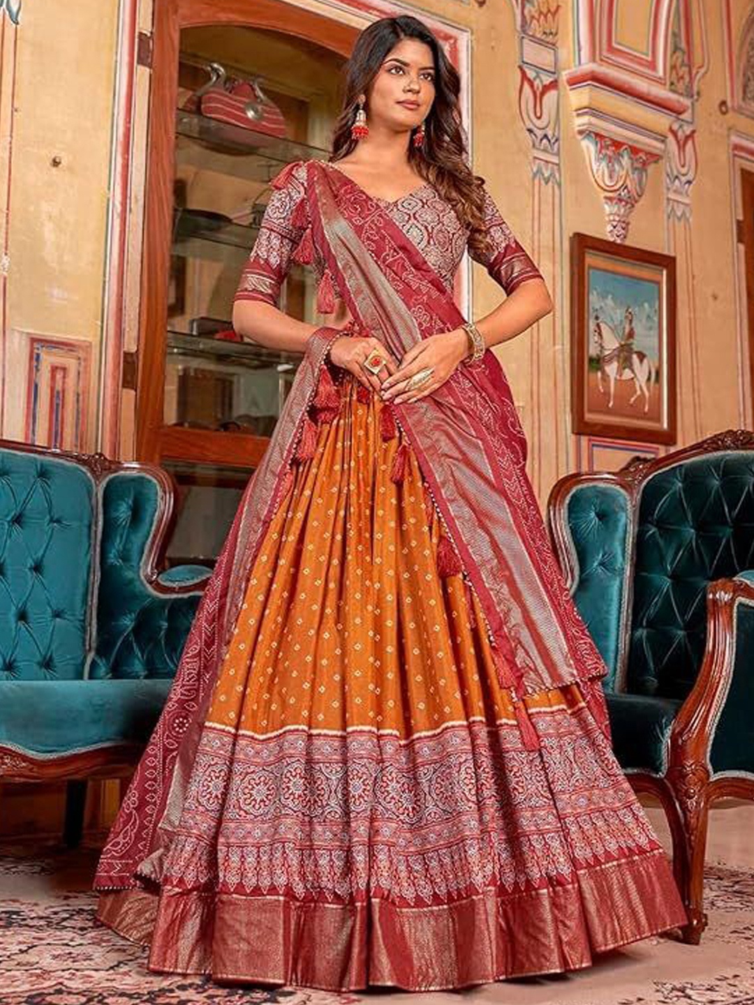 RADHVI BIZ Ethnic Motifs Printed Silk Lehenga And Semi-Stitched Blouse With Dupatta, Yellow
RADHVI BIZ Ethnic Motifs Printed Silk Lehenga And Semi-Stitched Blouse With Dupatta, Yellow