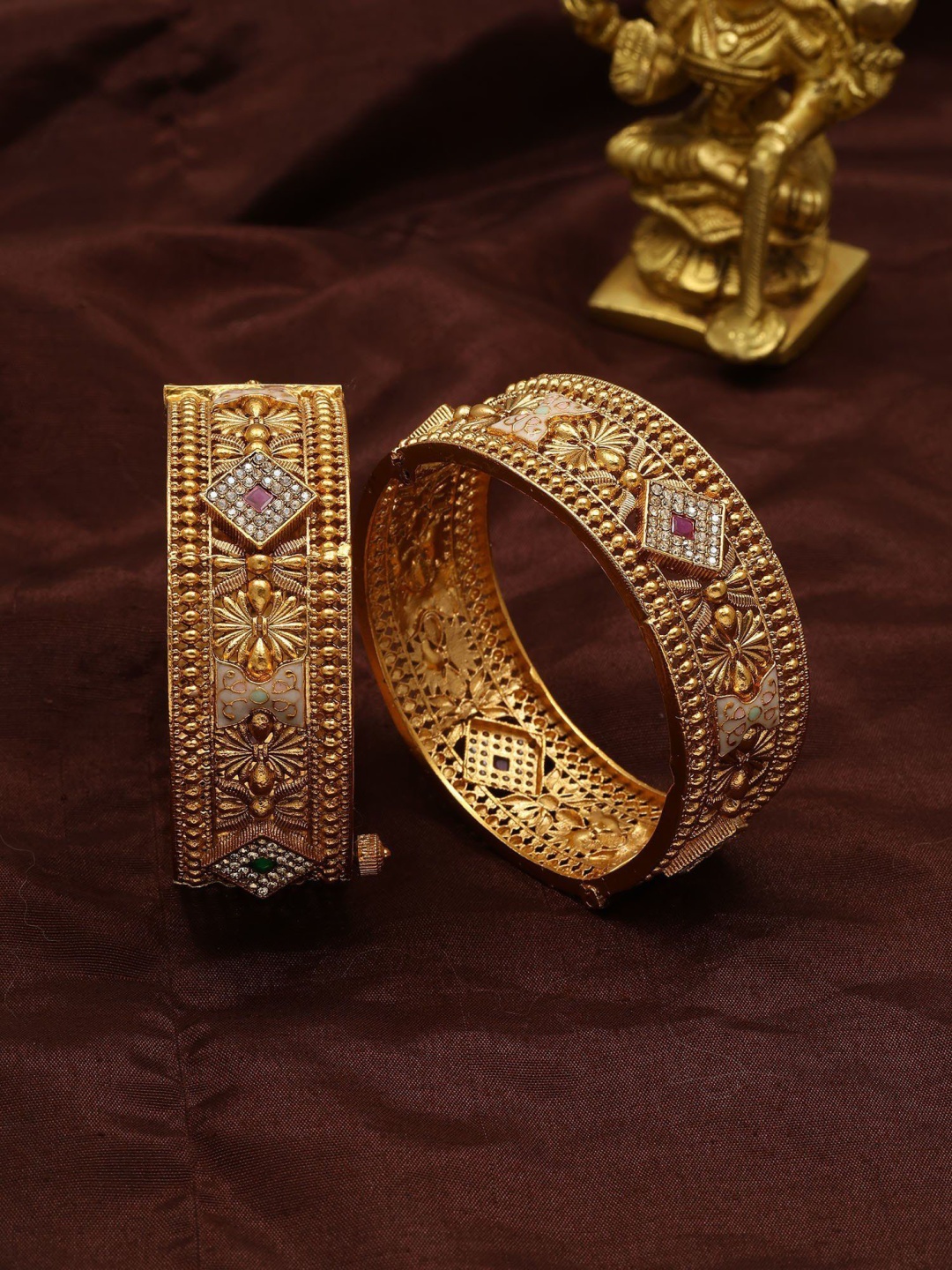 Exotic India Set Of 2 Gold-Plated Designer Artificial Stone Studded Openable Bangles
Exotic India Set Of 2 Gold-Plated Designer Artificial Stone Studded Openable Bangles