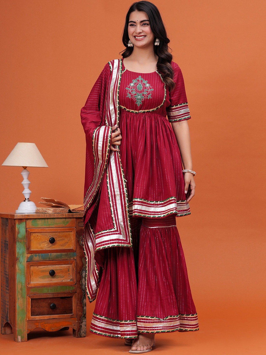 PINGAKSH Floral Embroidered Round Neck Pure Cotton Kurta with Sharara & Dupatta, Maroon
PINGAKSH Floral Embroidered Round Neck Pure Cotton Kurta with Sharara & Dupatta, Maroon