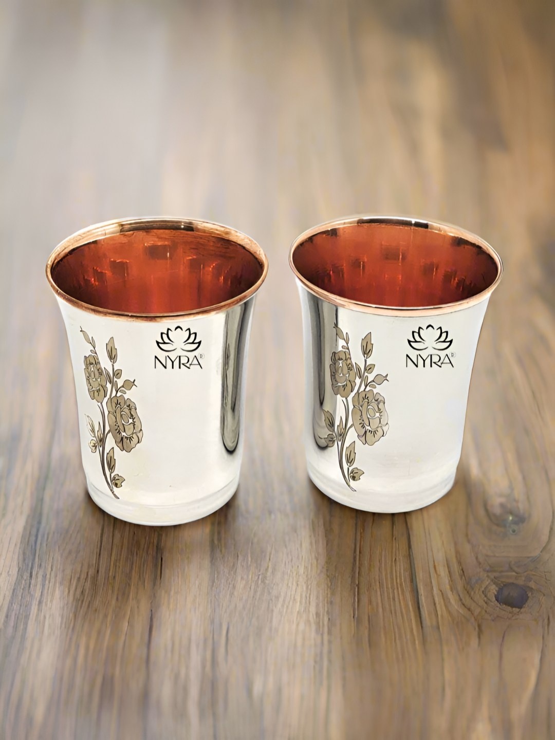 Nyra Kitchenware Silver-Toned 2 Pieces Floral Stainless Steel Water Glasses-300ml Each
Nyra Kitchenware Silver-Toned 2 Pieces Floral Stainless Steel Water Glasses-300ml Each