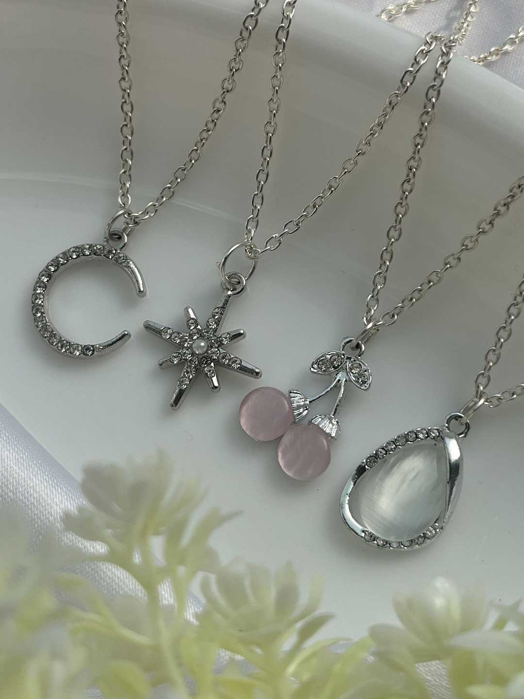 Jewelsbysirani Set Of 4 Silver-Plated American Diamond Studded Pendants With Chains
Jewelsbysirani Set Of 4 Silver-Plated American Diamond Studded Pendants With Chains
