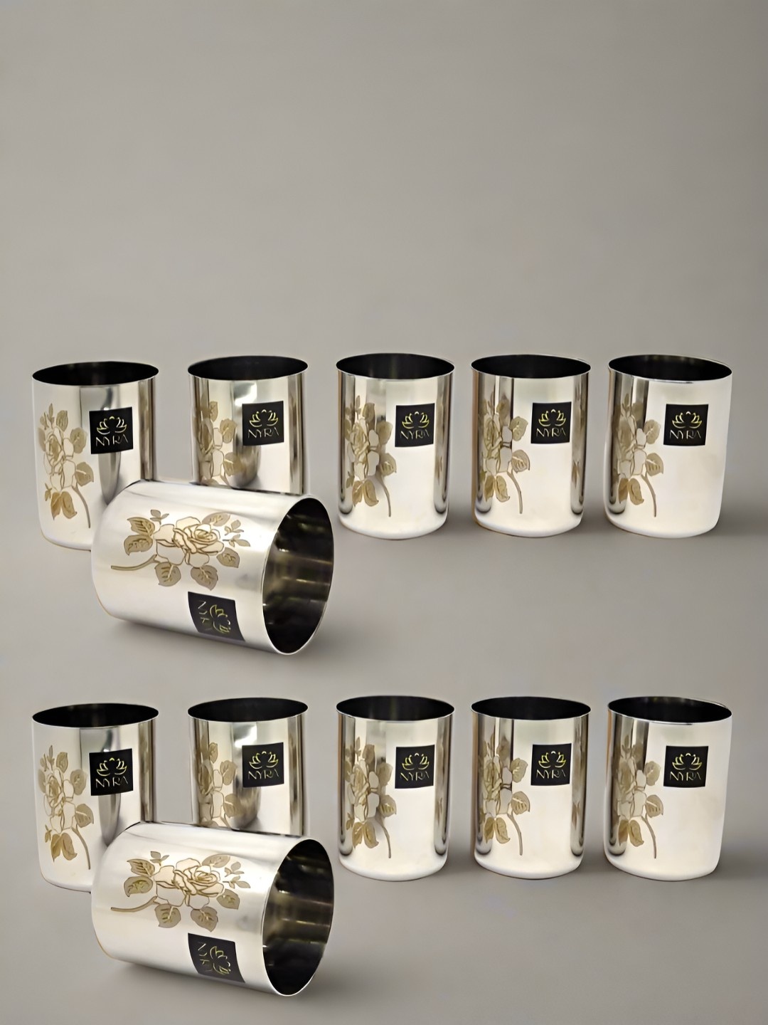 Nyra Kitchenware Silver-Toned & Brown 12 Pieces Stainless Steel Water Glasses-400 ml Each
Nyra Kitchenware Silver-Toned & Brown 12 Pieces Stainless Steel Water Glasses-400 ml Each