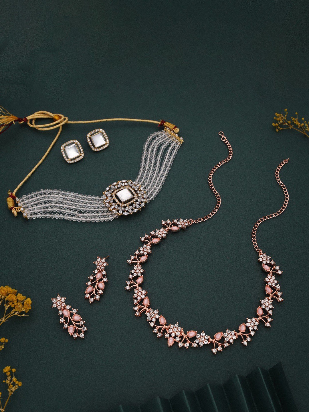 Lyriss Set Of 2 Gold-Plated & Rose Gold-Plated American Diamond Studded Jewellery Set
Lyriss Set Of 2 Gold-Plated & Rose Gold-Plated American Diamond Studded Jewellery Set