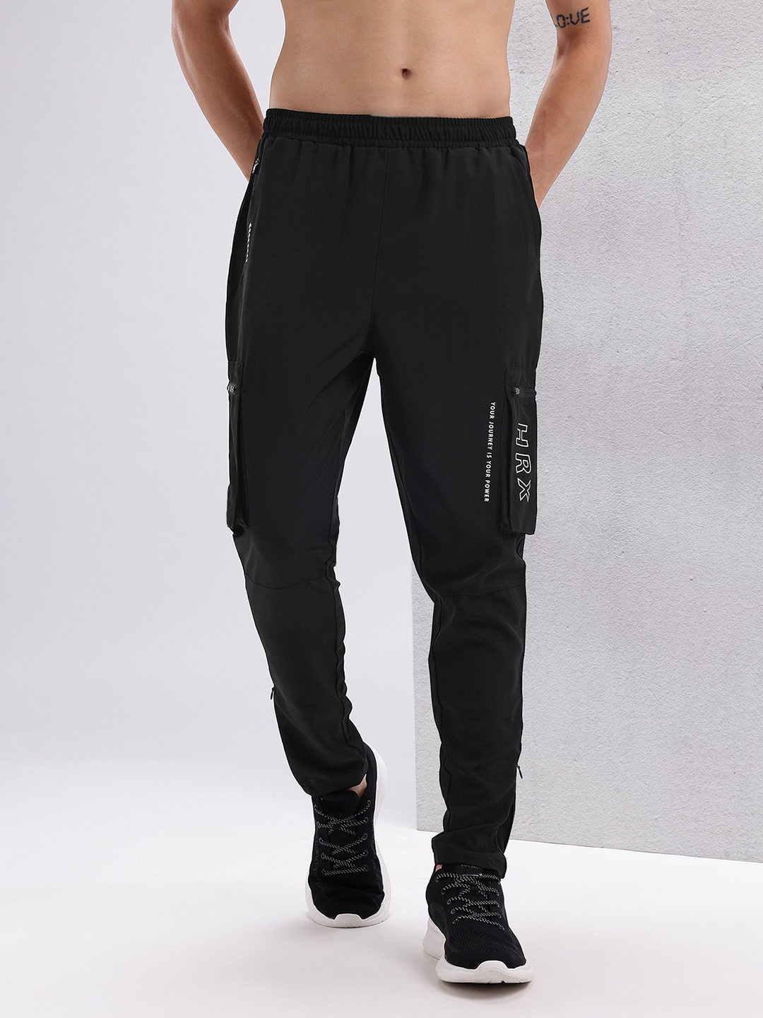HRX by Hrithik Roshan Men Brand Logo Printed Rapid-Dry Training Track Pants, Black
HRX by Hrithik Roshan Men Brand Logo Printed Rapid-Dry Training Track Pants, Black