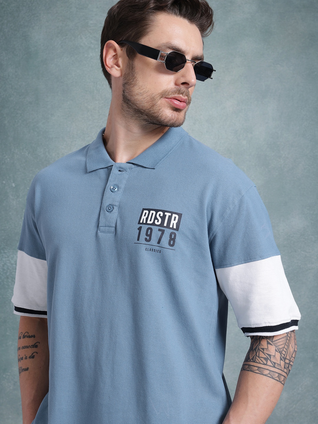 The Roadster Life Co. Brand Logo Printed Drop-Shoulder Sleeves Pure Cotton T-shirt, Blue
The Roadster Life Co. Brand Logo Printed Drop-Shoulder Sleeves Pure Cotton T-shirt, Blue