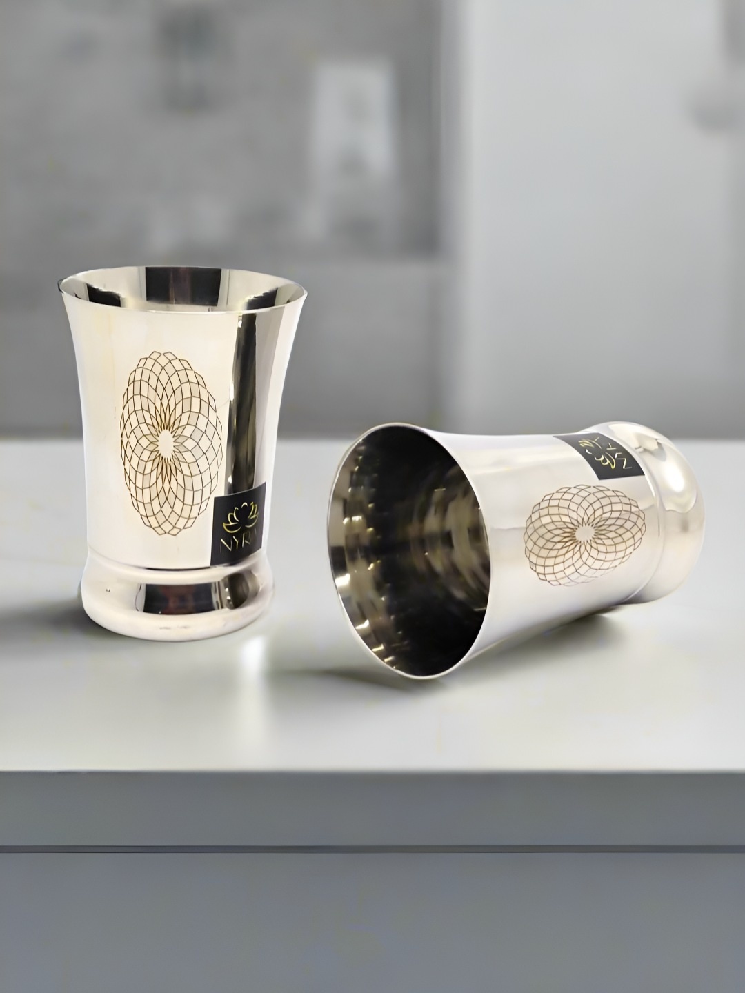 Nyra Kitchenware Silver-Toned 2 Pieces Floral Stainless Steel Water Glasses-450 ml Each
Nyra Kitchenware Silver-Toned 2 Pieces Floral Stainless Steel Water Glasses-450 ml Each
