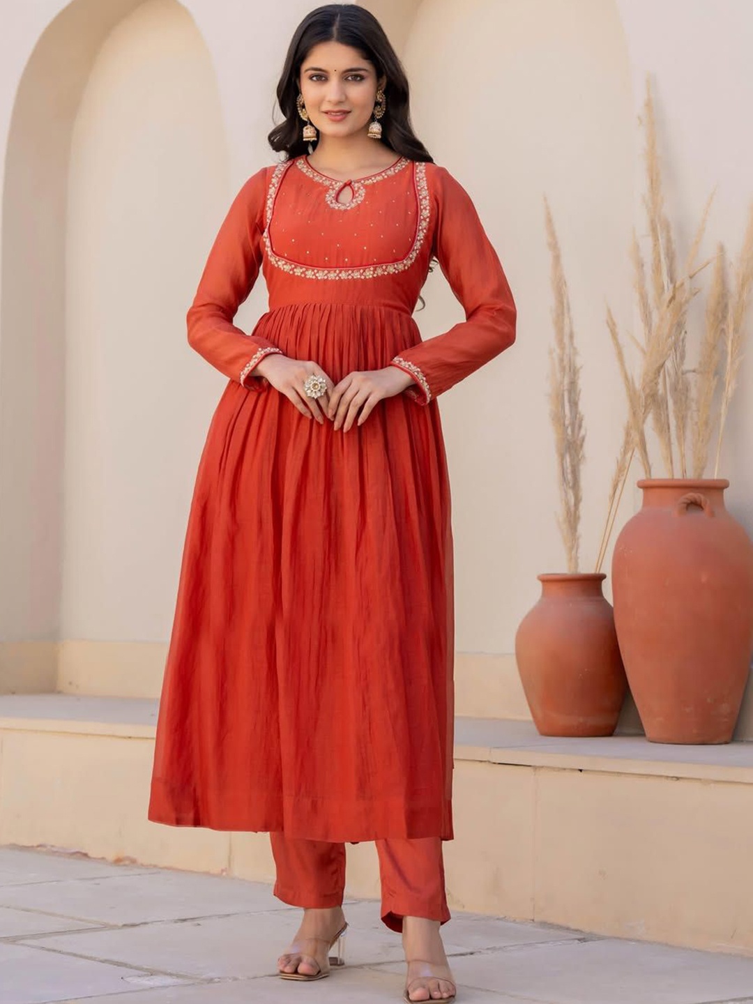 KALINI Women Floral Yoke Design Pleated Sequinned Kurta with Trousers & With Dupatta, Orange
KALINI Women Floral Yoke Design Pleated Sequinned Kurta with Trousers & With Dupatta, Orange