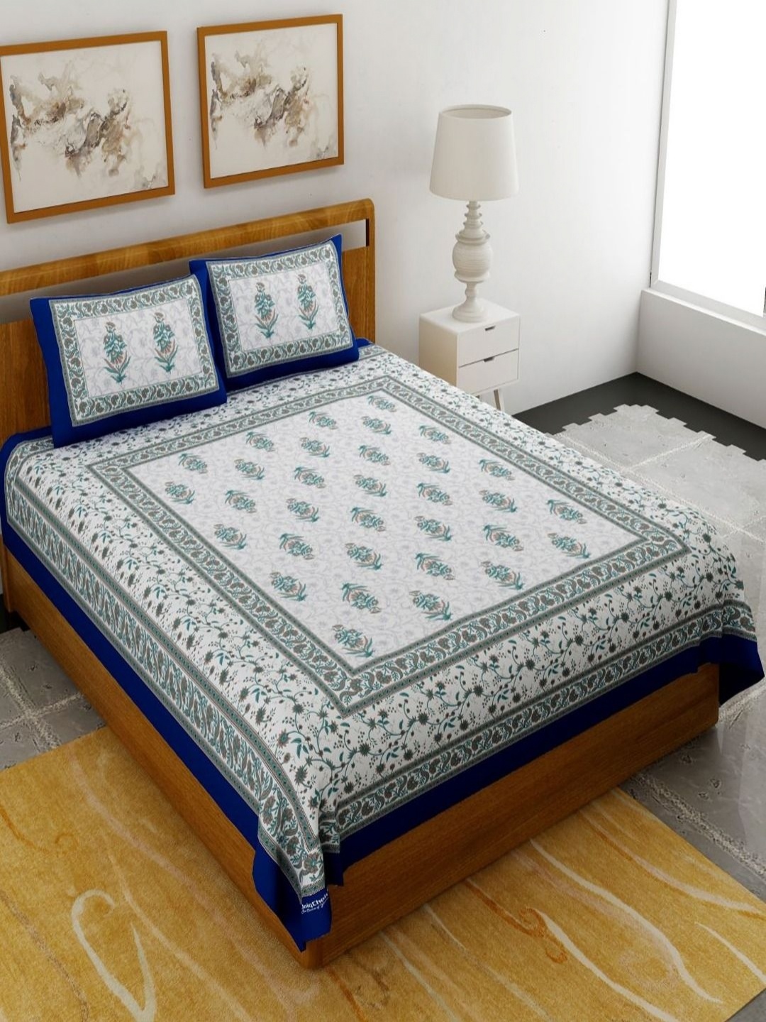 Myntra Elegant Homes Blue & White Ethnic Motifs 120 TC Queen Bedsheet with 2 Pillow Covers
Myntra Elegant Homes Blue & White Ethnic Motifs 120 TC Queen Bedsheet with 2 Pillow Covers