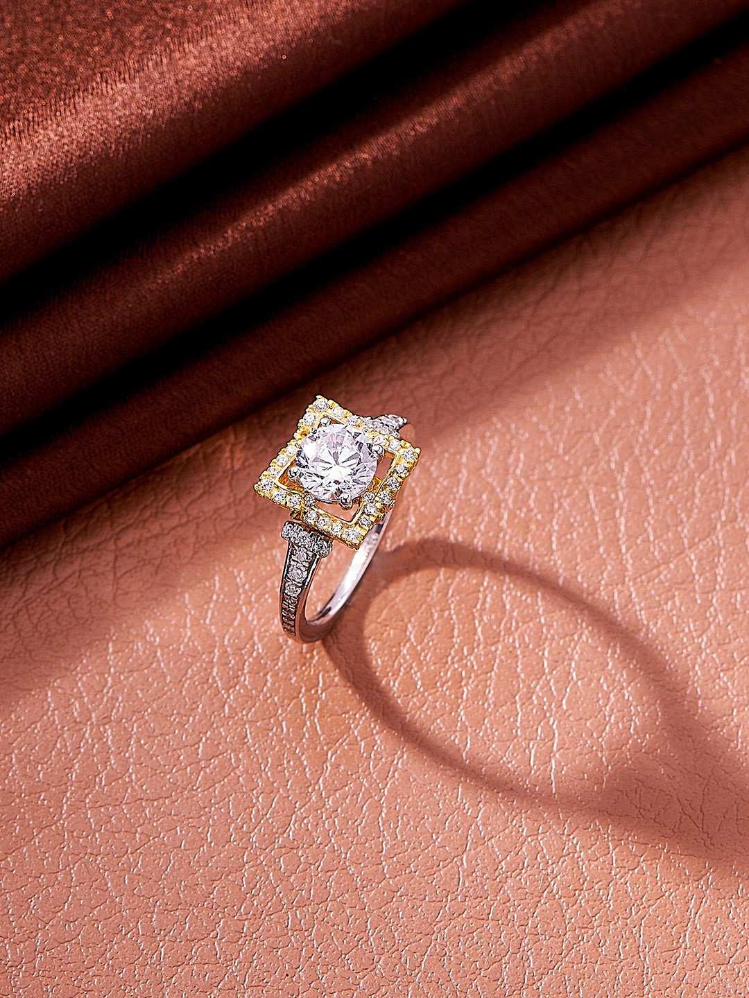 Nipura 925 Sterling Silver Rhodium-Plated Pleat Golden Crown Solitaire Finger Ring
Nipura 925 Sterling Silver Rhodium-Plated Pleat Golden Crown Solitaire Finger Ring