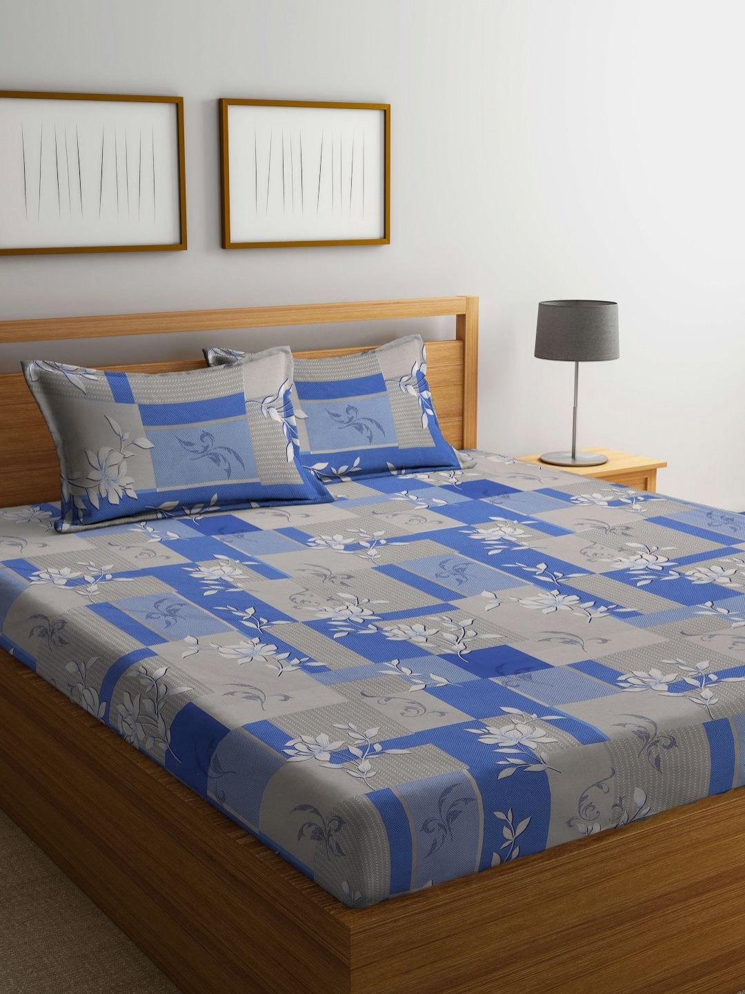 Myntra Elegant Homes Silver-Toned & Blue Floral 400 TC King Bedsheet with 2 Pillow Covers
Myntra Elegant Homes Silver-Toned & Blue Floral 400 TC King Bedsheet with 2 Pillow Covers