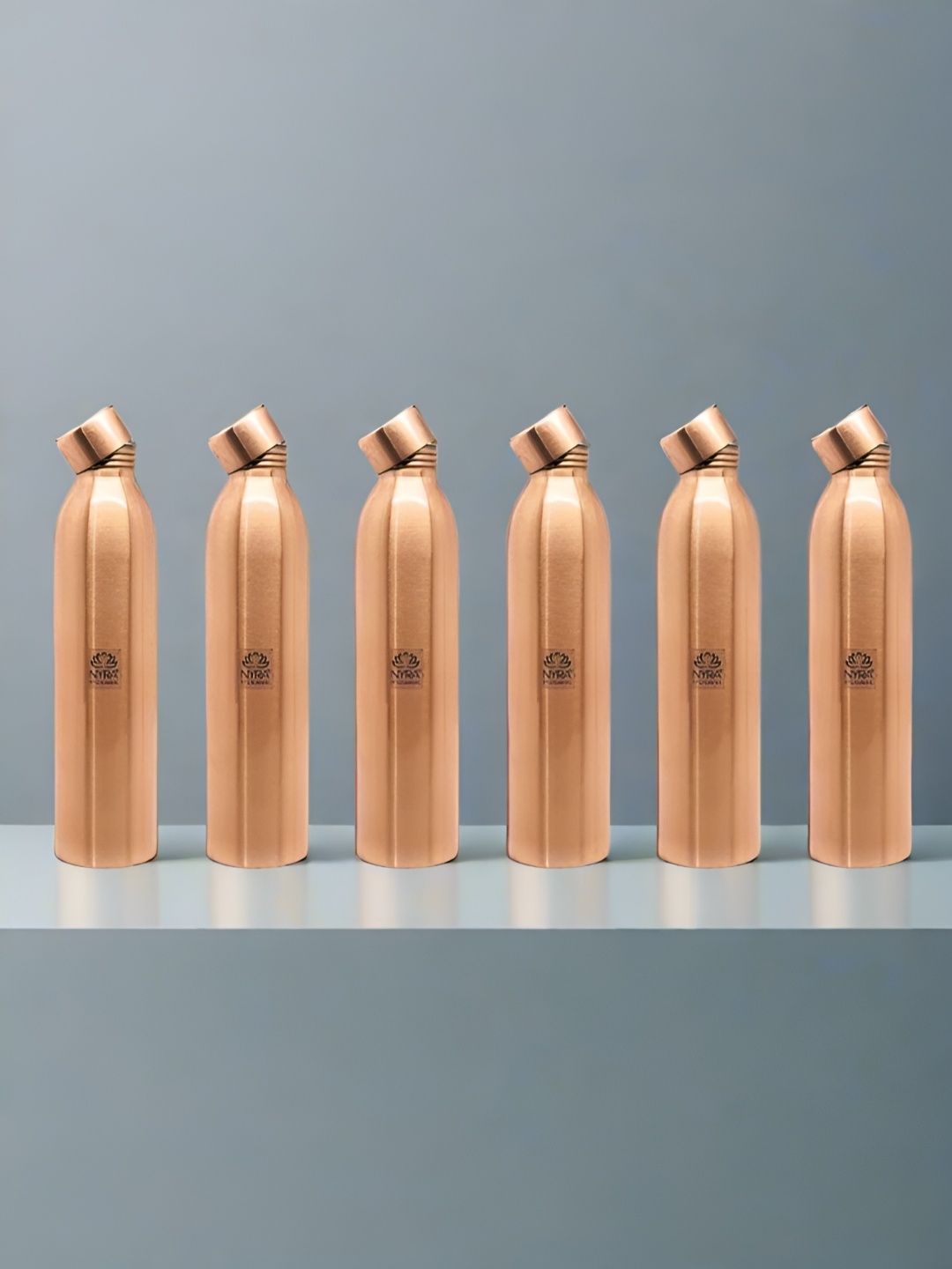 Nyra Kitchenware Copper-Toned & Black Set of 6 Copper Printed Double Wall Vacuum Water Bottle
Nyra Kitchenware Copper-Toned & Black Set of 6 Copper Printed Double Wall Vacuum Water Bottle