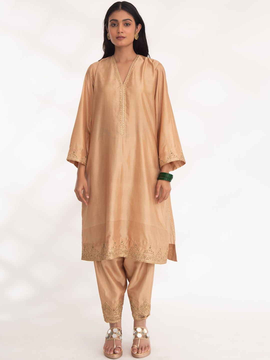 Chhaya Mehrotra Women Ethnic Motifs Pleated Zardozi Pure Silk Kurti with Trousers, Beige
Chhaya Mehrotra Women Ethnic Motifs Pleated Zardozi Pure Silk Kurti with Trousers, Beige