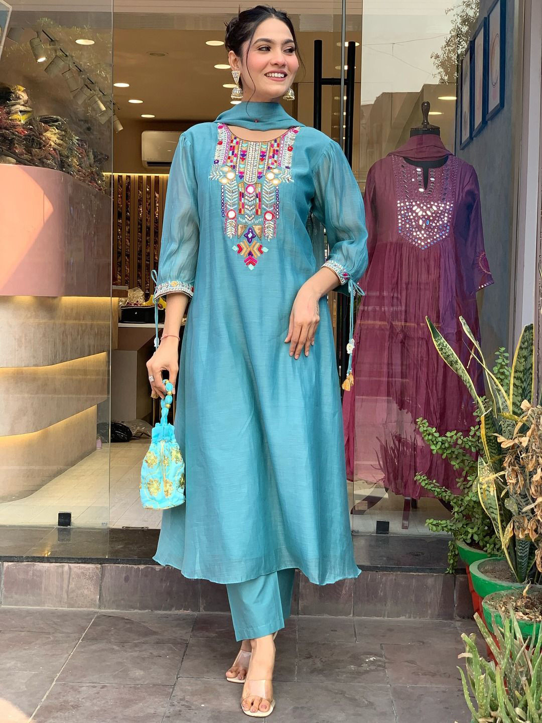 KALINI Women Ethnic Motifs Embroidered Regular Mirror Work Chanderi Silk Kurta with Trousers & With Dupatta, Turquoise blue
KALINI Women Ethnic Motifs Embroidered Regular Mirror Work Chanderi Silk Kurta with Trousers & With Dupatta, Turquoise blue