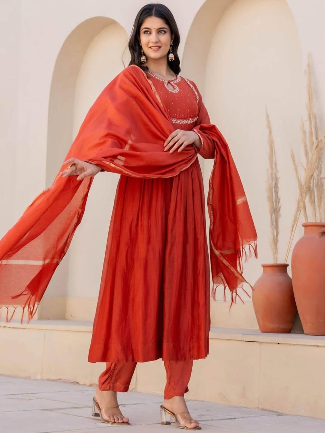 KALINI Women Ethnic Motifs Embroidered Regular Kurta with Trousers & With Dupatta, Orange
KALINI Women Ethnic Motifs Embroidered Regular Kurta with Trousers & With Dupatta, Orange