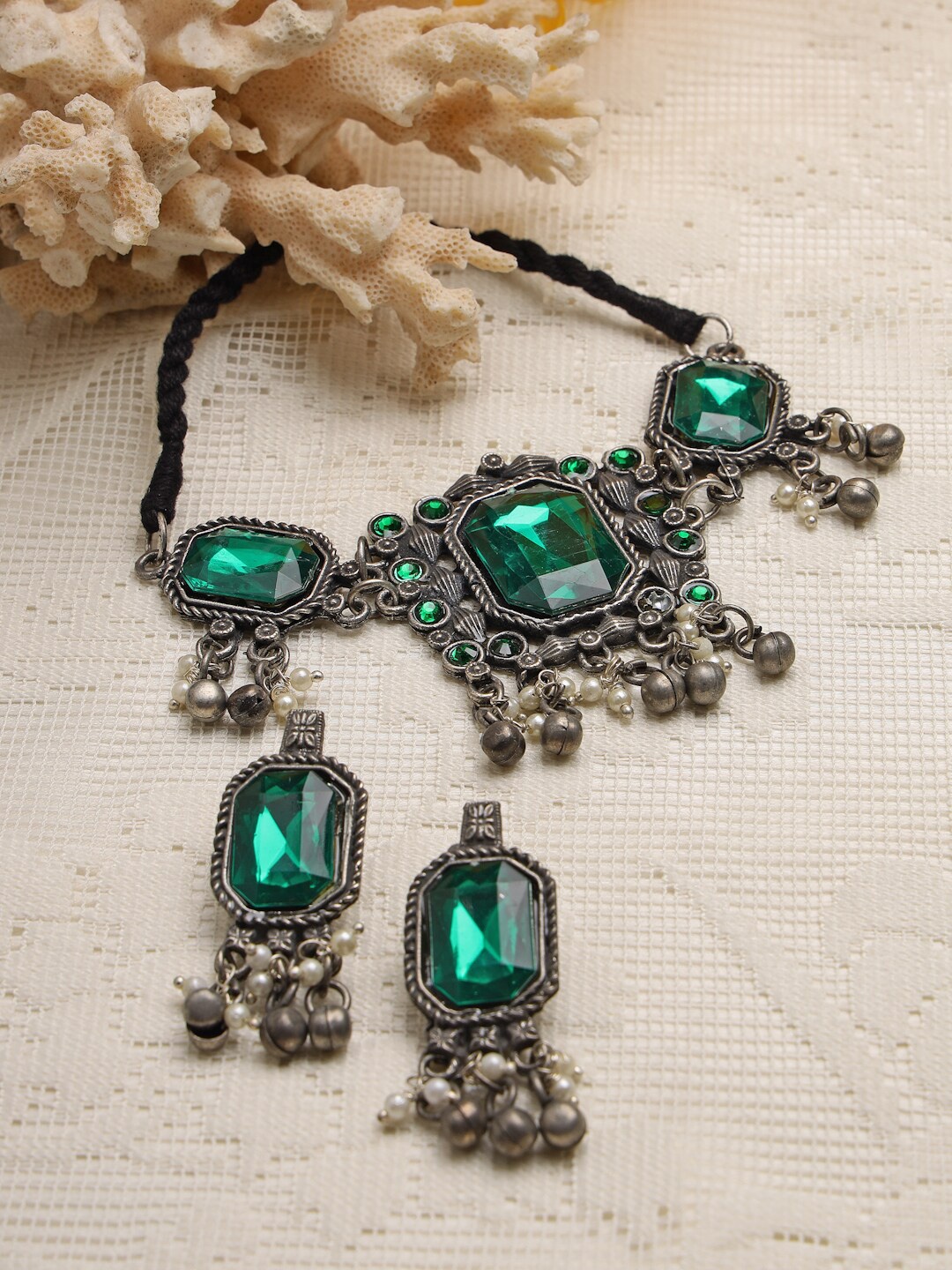 Moedbuille Oxidised Silver-Plated Green Crystals & Pearls Studded Choker Jewellery Set
Moedbuille Oxidised Silver-Plated Green Crystals & Pearls Studded Choker Jewellery Set