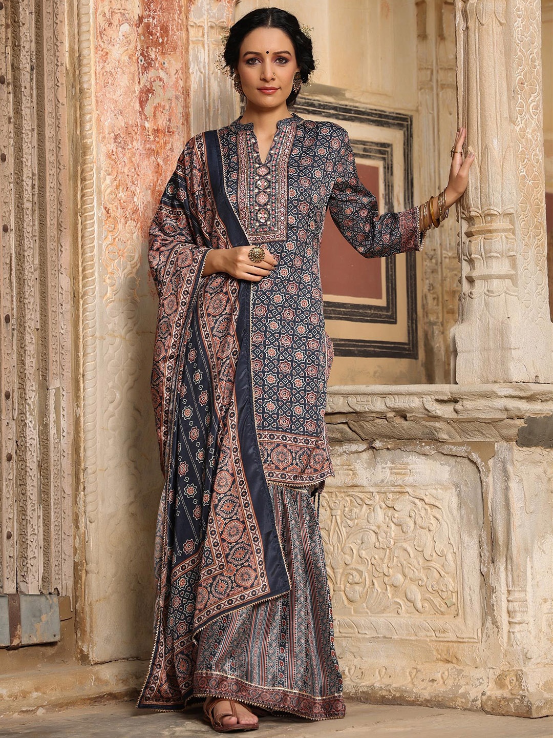 SCAKHI Women Navy Blue Ethnic Motifs Printed Sequinned Kurti with Sharara & With Dupatta
SCAKHI Women Navy Blue Ethnic Motifs Printed Sequinned Kurti with Sharara & With Dupatta