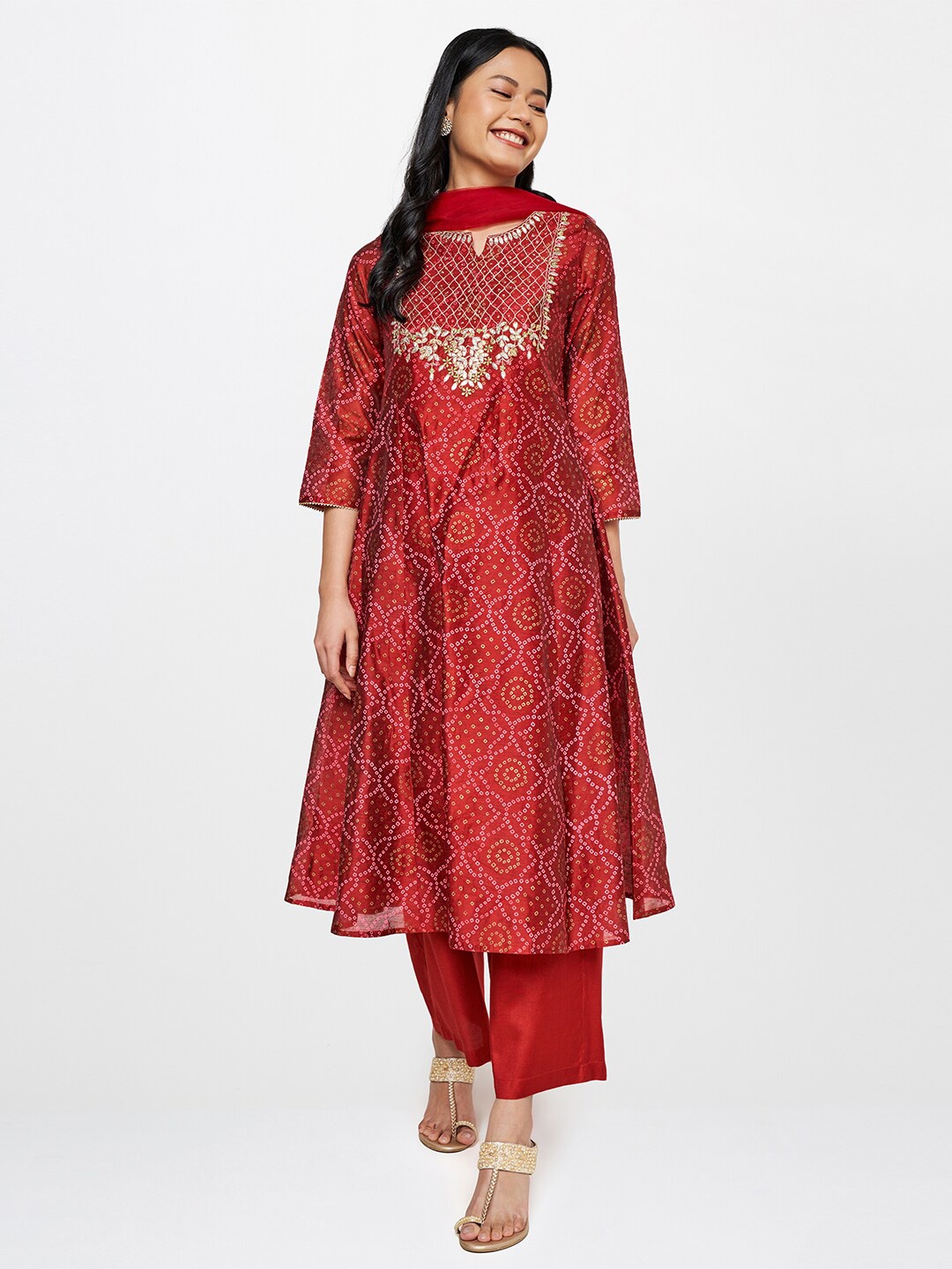 Global Desi Women Red Bandhani Embroidered Gotta Patti Kurta with Trousers & With Dupatta
Global Desi Women Red Bandhani Embroidered Gotta Patti Kurta with Trousers & With Dupatta