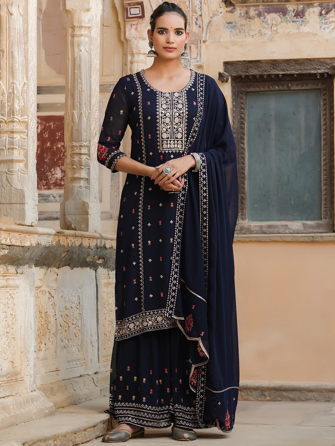 SCAKHI Women Navy Blue Floral Embroidered Thread Work Kurta with Sharara & With Dupatta
SCAKHI Women Navy Blue Floral Embroidered Thread Work Kurta with Sharara & With Dupatta
