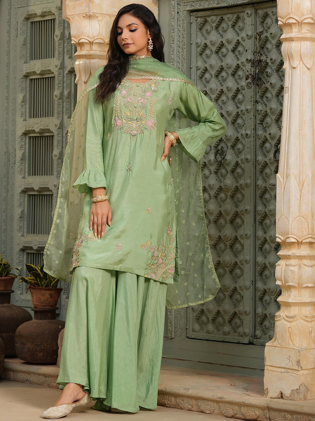 SCAKHI Women Green Floral Embroidered Bell Sleeved Kurta with Palazzos & With Dupatta
SCAKHI Women Green Floral Embroidered Bell Sleeved Kurta with Palazzos & With Dupatta