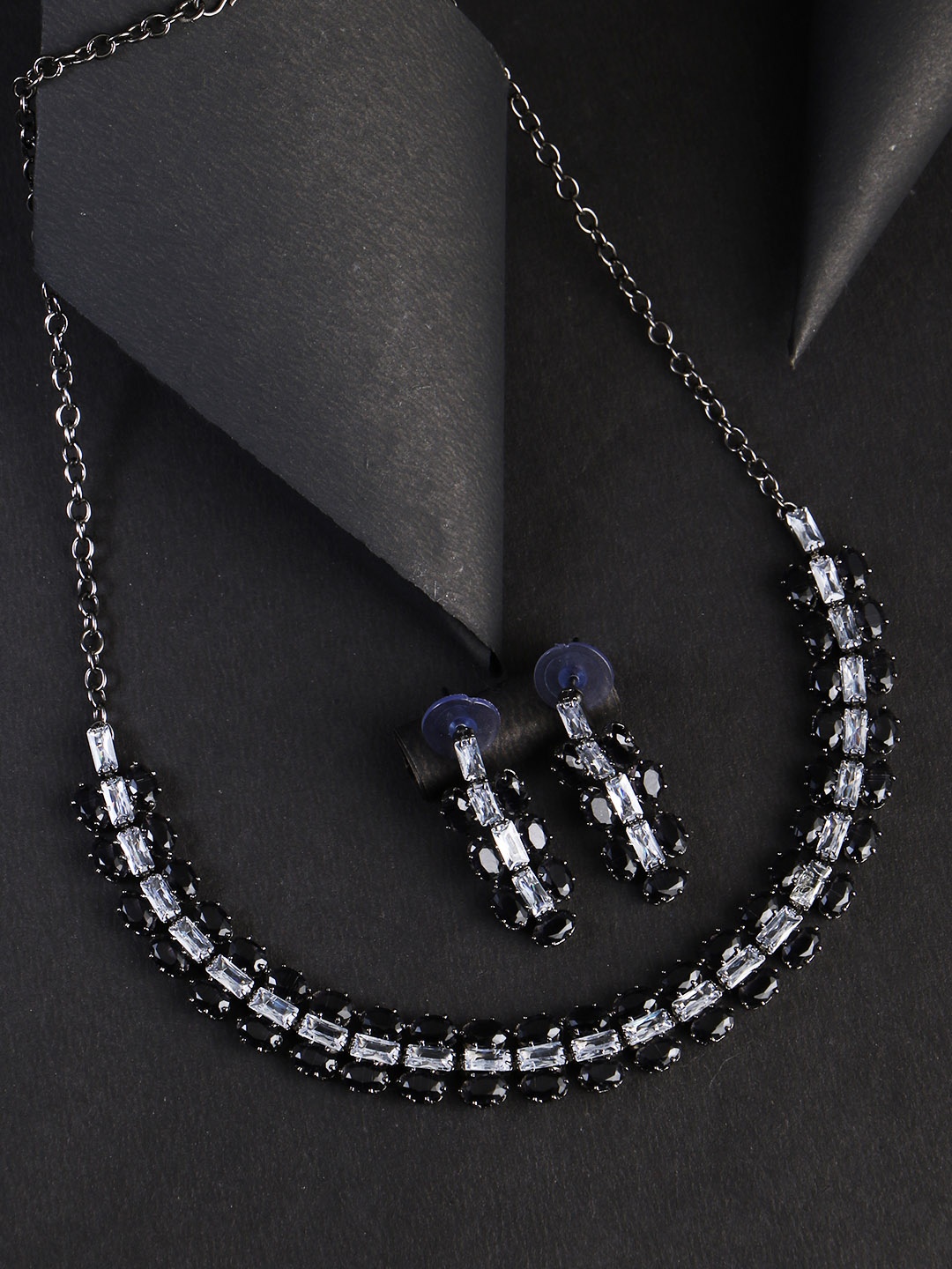Adwitiya Collection Rhodium-Plated Silver-Toned White & Black Stone-Studded Jewellery Set
Adwitiya Collection Rhodium-Plated Silver-Toned White & Black Stone-Studded Jewellery Set