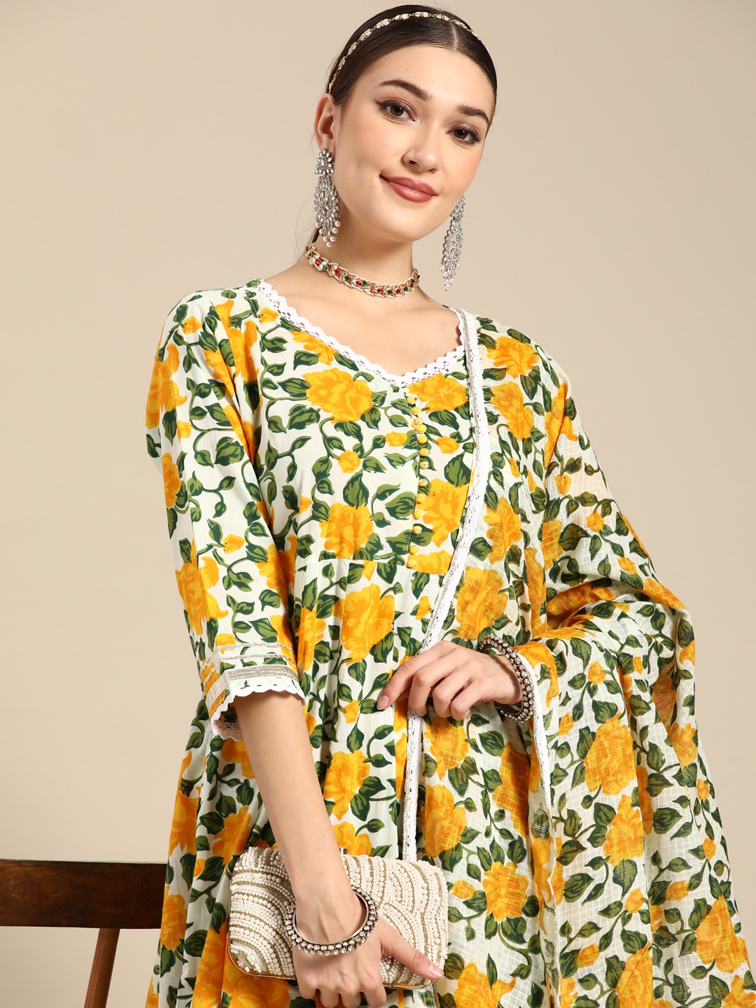 Sangria Women Yellow Floral Printed Lace Inserts Pure Cotton Kurta with Sharara & Dupatta
Sangria Women Yellow Floral Printed Lace Inserts Pure Cotton Kurta with Sharara & Dupatta