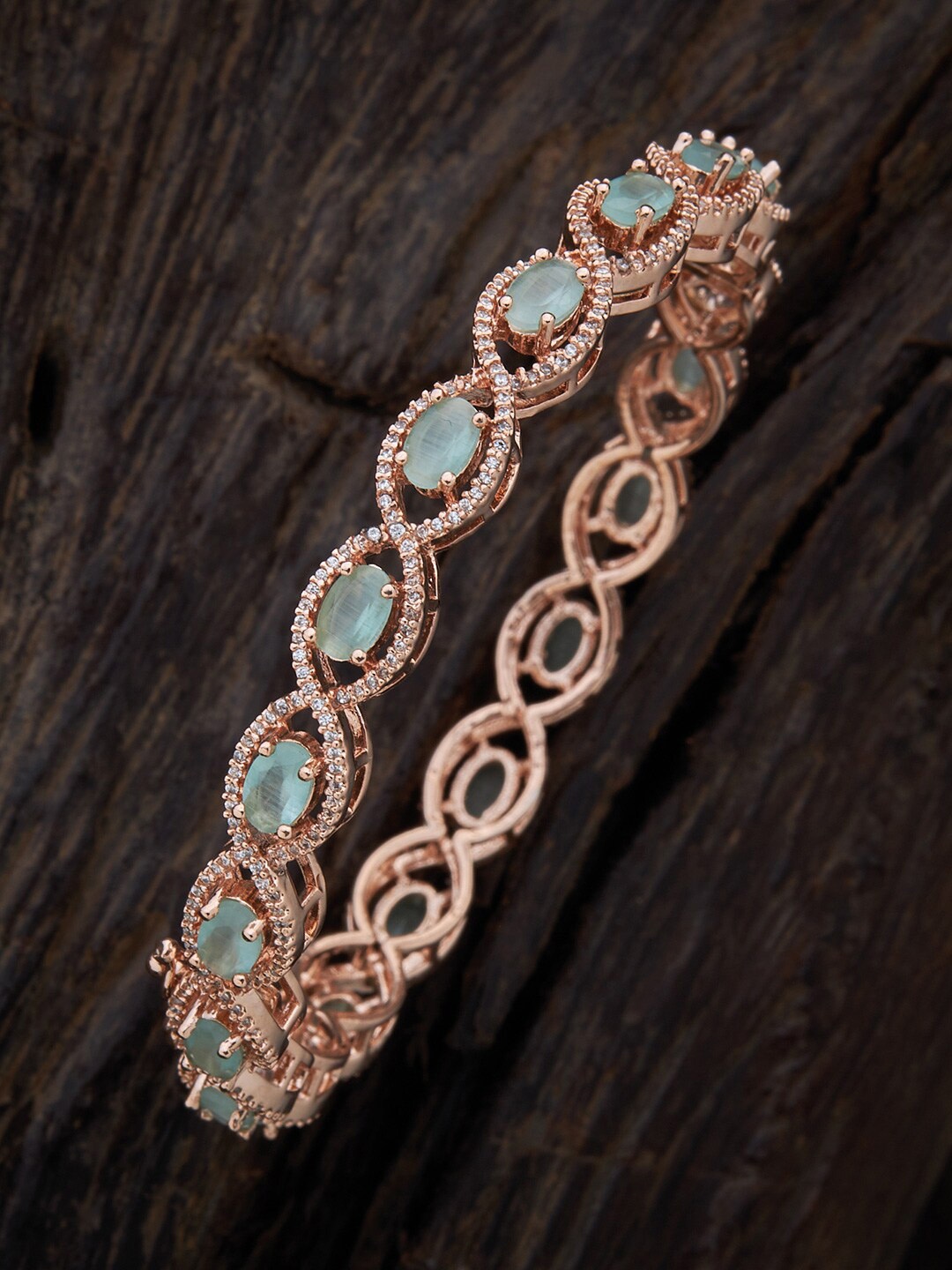 Kushal's Fashion Jewellery Rose Gold-Plated Rose Gold-Toned Sea Green CZ Studded Bangle
Kushal's Fashion Jewellery Rose Gold-Plated Rose Gold-Toned Sea Green CZ Studded Bangle