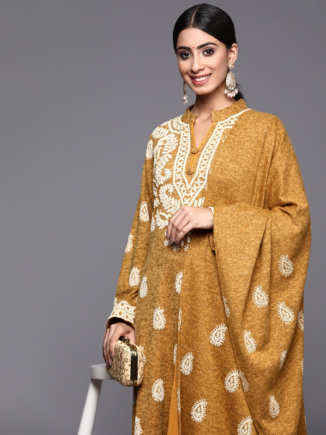 Libas Women Paisley Embroidered Pashmina Wool Kurta with Trousers & Dupatta, Mustard
Libas Women Paisley Embroidered Pashmina Wool Kurta with Trousers & Dupatta, Mustard