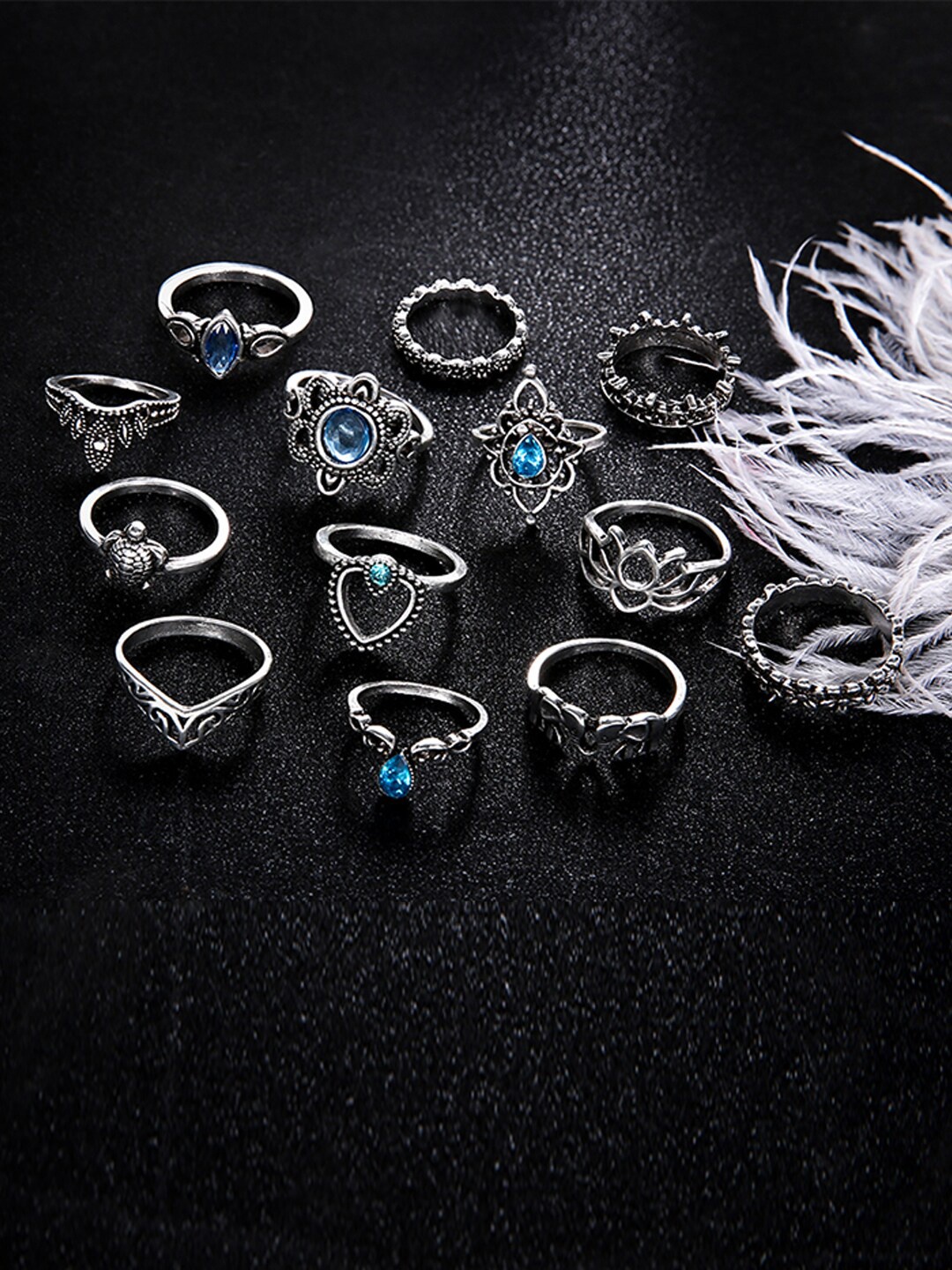 Jewels Galaxy Set Of 13 Silver-Plated & Toned Blue Stones Studded Oxidised Finger Rings
Jewels Galaxy Set Of 13 Silver-Plated & Toned Blue Stones Studded Oxidised Finger Rings
