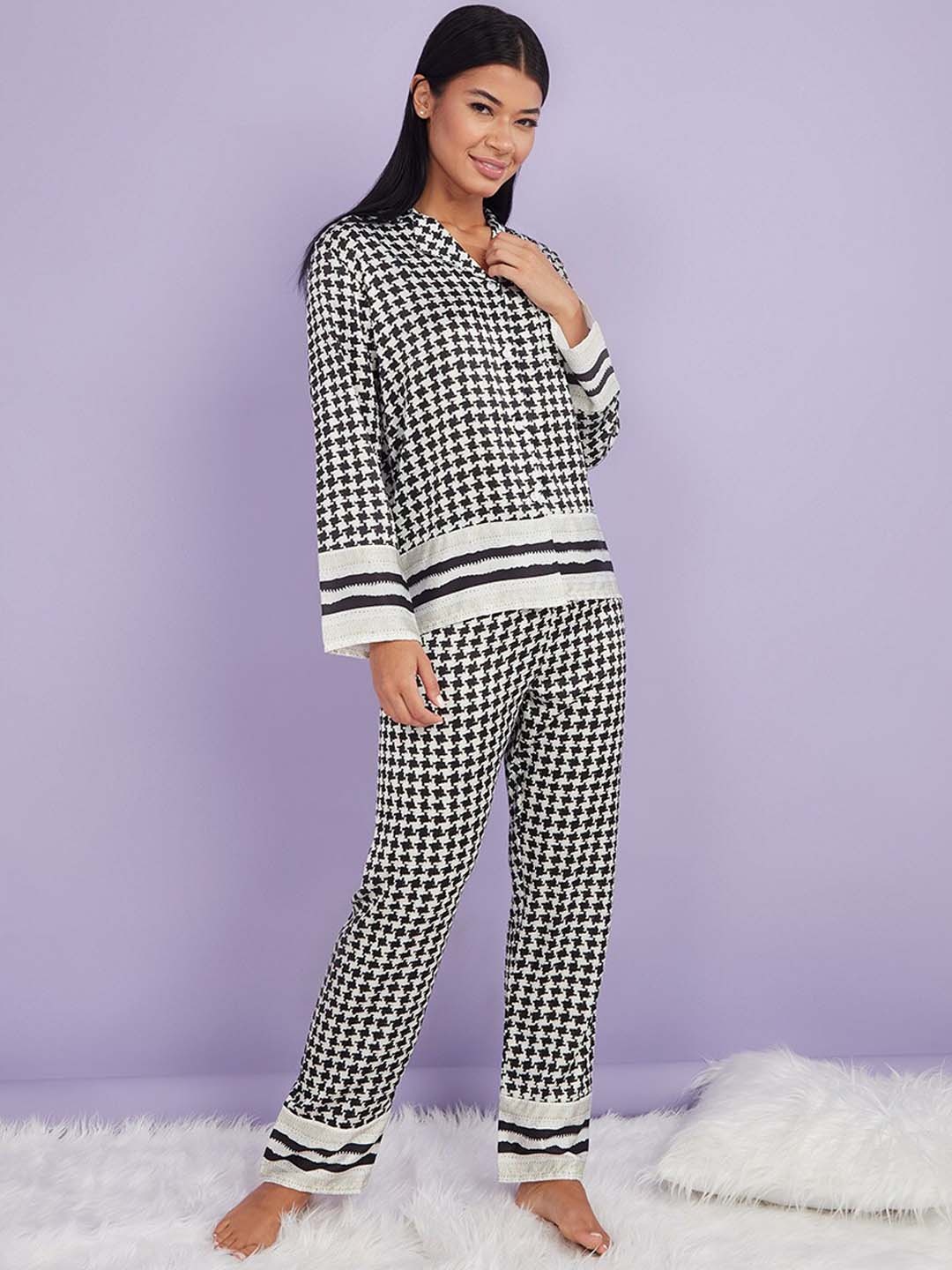 Styli Women Black & White Houndstooth & Stripe Print Button Through Shirt and Pyjama Set
Styli Women Black & White Houndstooth & Stripe Print Button Through Shirt and Pyjama Set