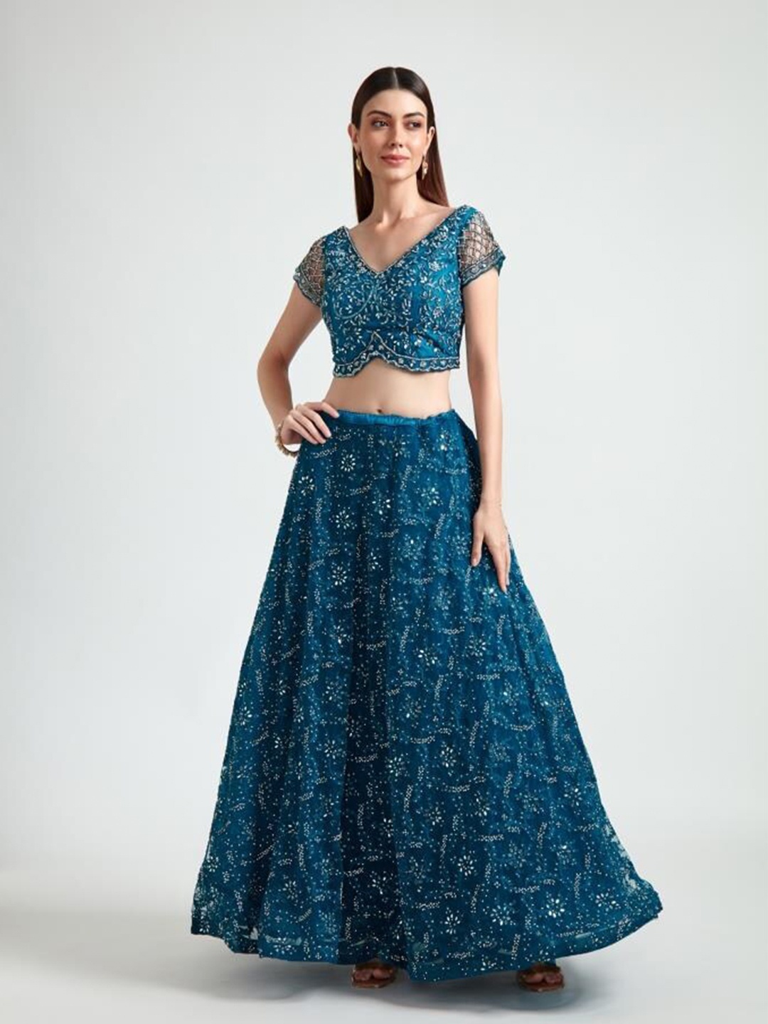 Neerus Women Blue & Silver-Toned Embroidered Beads and Stone Lehenga & Blouse With Dupatta
Neerus Women Blue & Silver-Toned Embroidered Beads and Stone Lehenga & Blouse With Dupatta