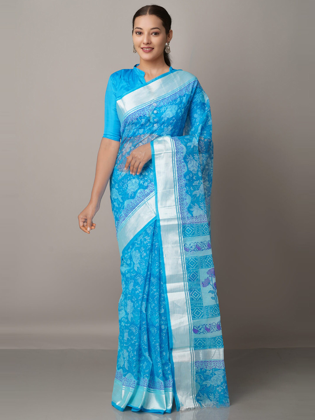 Unnati Silks Blue & Purple Ethnic Motifs Zari Pure Cotton Kota Saree
Unnati Silks Blue & Purple Ethnic Motifs Zari Pure Cotton Kota Saree