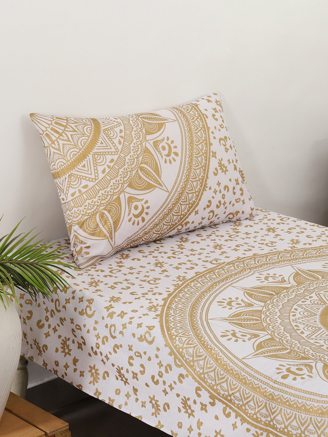 HANDICRAFT PALACE White & Gold-Toned Ethnic Motifs 144 TC Single Bedsheet with 1 Pillow Covers
HANDICRAFT PALACE White & Gold-Toned Ethnic Motifs 144 TC Single Bedsheet with 1 Pillow Covers