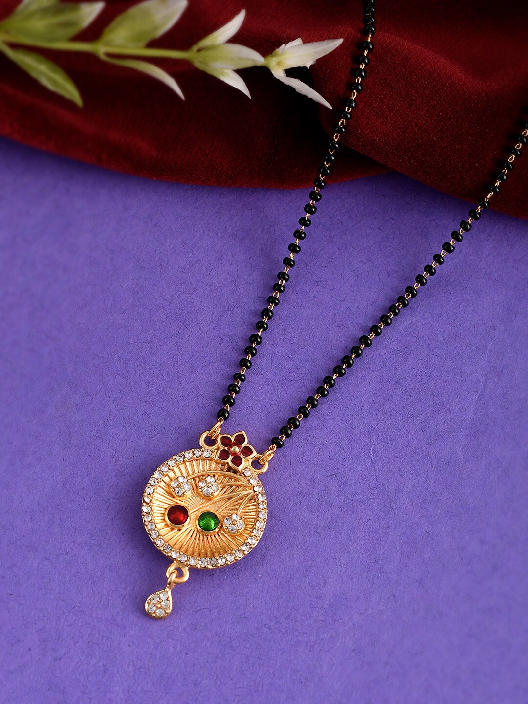 Silvermerc Designs Gold-Plated & Toned Black Beaded & Stones-Studded Mangalsutra
Silvermerc Designs Gold-Plated & Toned Black Beaded & Stones-Studded Mangalsutra