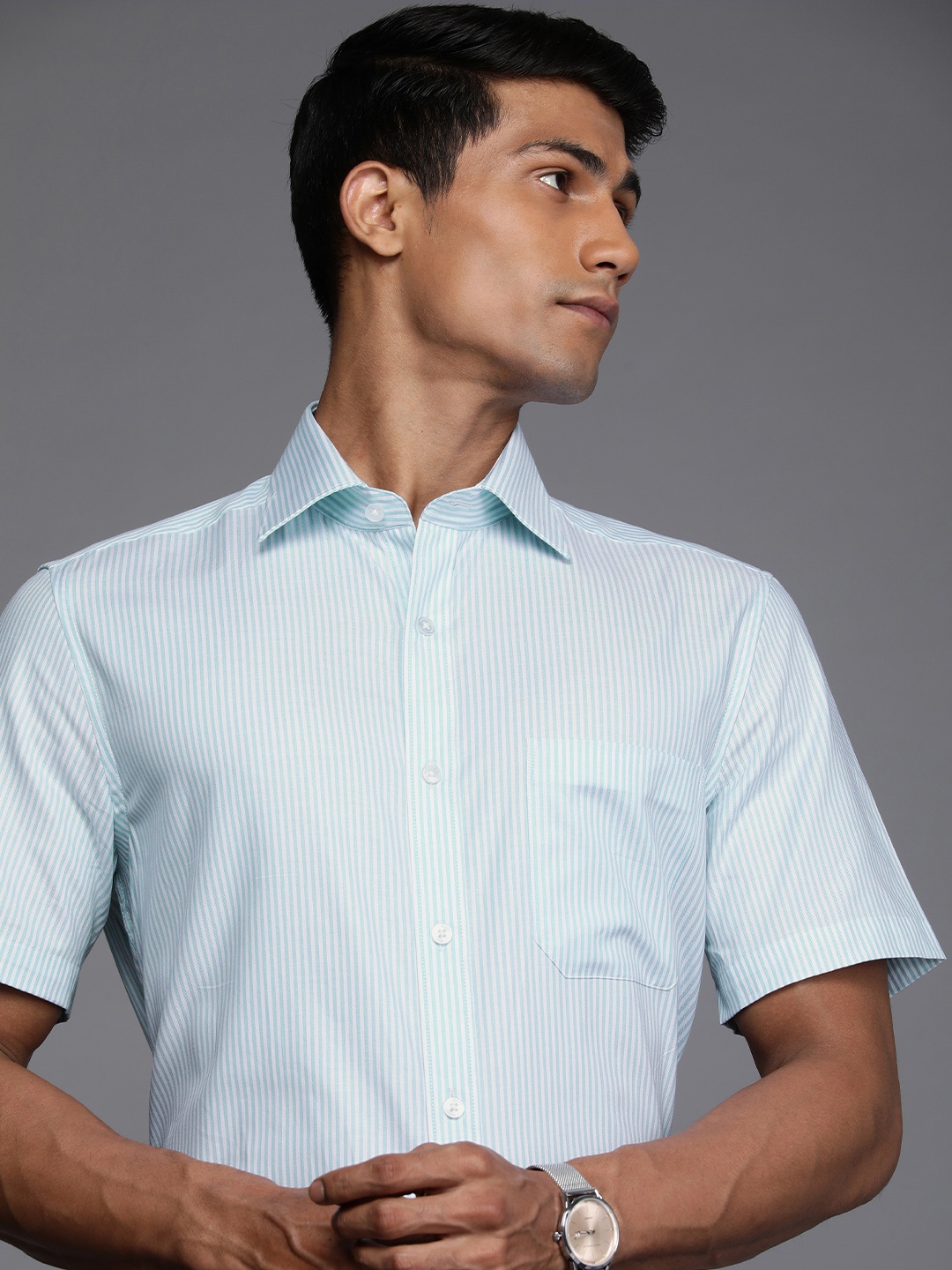Louis Philippe Men Light Blue & White Classic Vertical Striped Pure Cotton Formal Shirt
Louis Philippe Men Light Blue & White Classic Vertical Striped Pure Cotton Formal Shirt