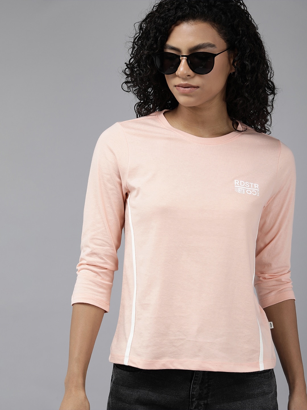 The Roadster Lifestyle Co. Solid Round Neck Regular Top With Contrast Tape Detailing, Peach
The Roadster Lifestyle Co. Solid Round Neck Regular Top With Contrast Tape Detailing, Peach