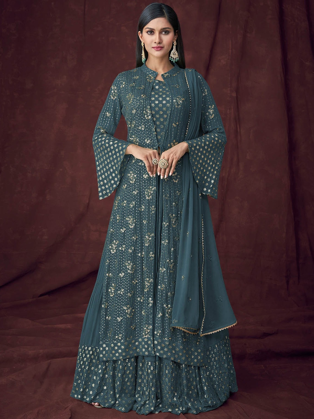 ODETTE Women Floral Embroidered Layered Sequinned Semi Stitched Kurta with Skirt & Dupatta, Teal
ODETTE Women Floral Embroidered Layered Sequinned Semi Stitched Kurta with Skirt & Dupatta, Teal